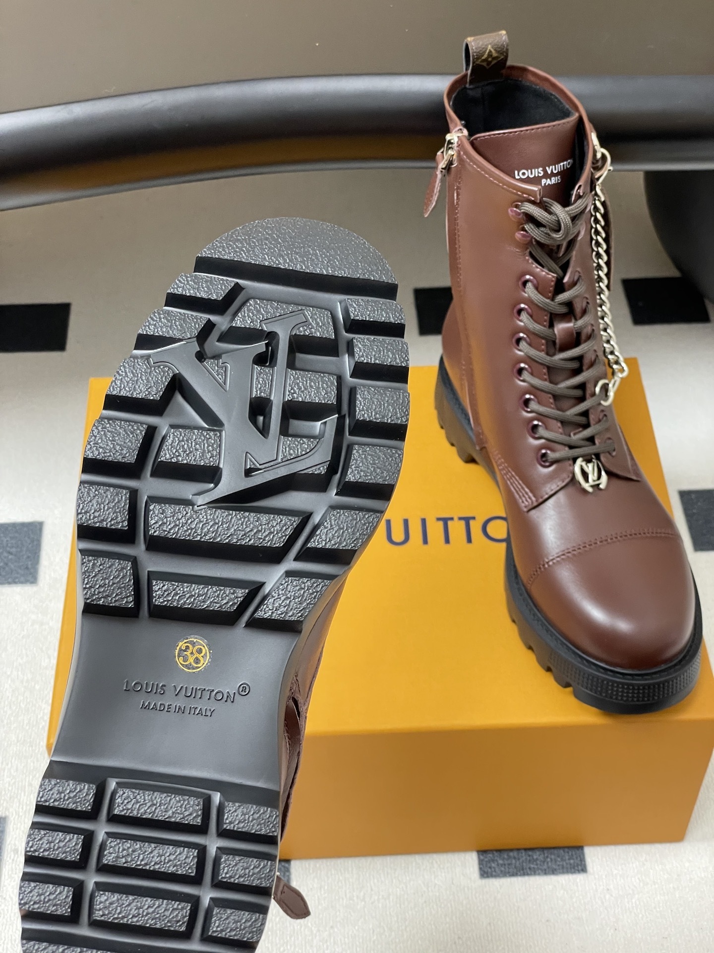Luxury Brown Leather Combat Boots with Signature Monogram Detail