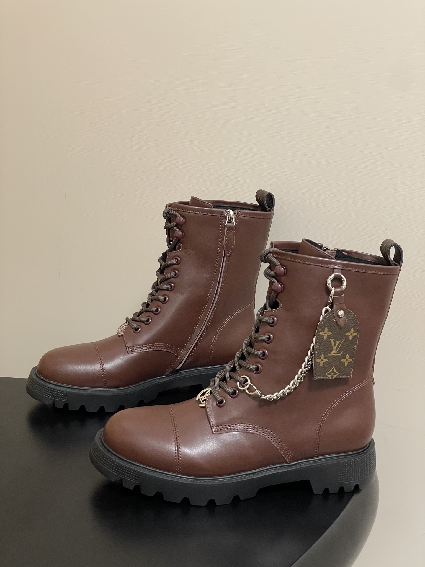 Luxury Brown Leather Combat Boots with Signature Monogram Detail
