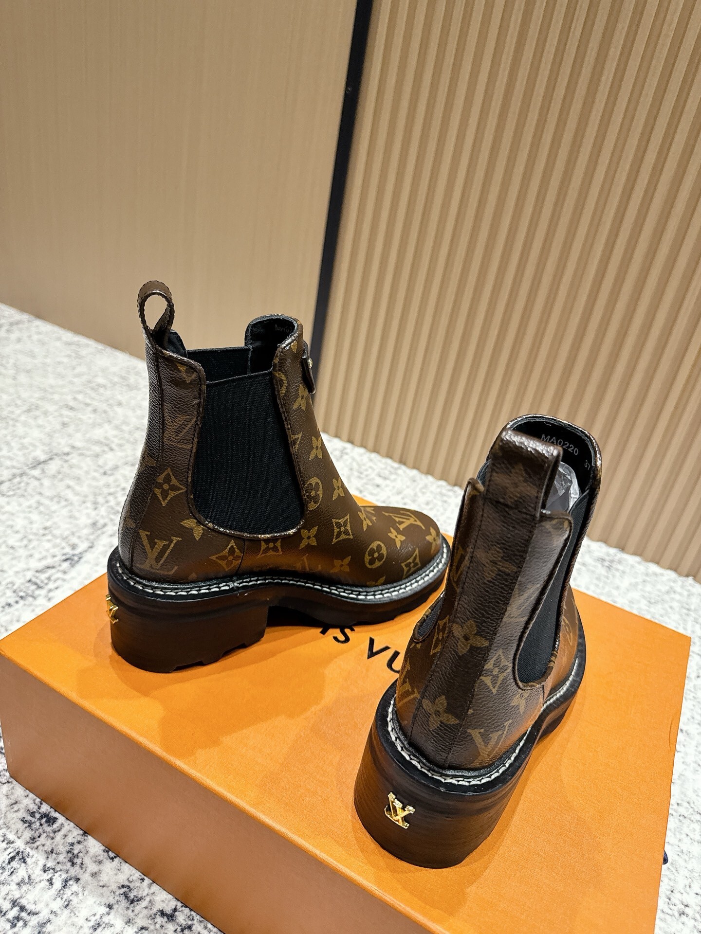 Louis Vuitton Women's Monogram Canvas Ankle Boots