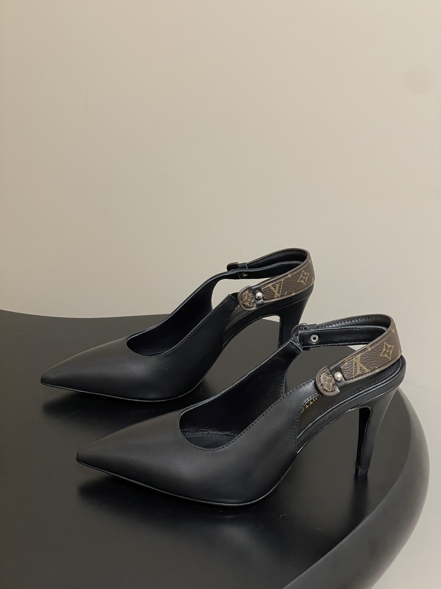 Louis Vuitton Black Leather Slingback Pumps with Monogram Detail