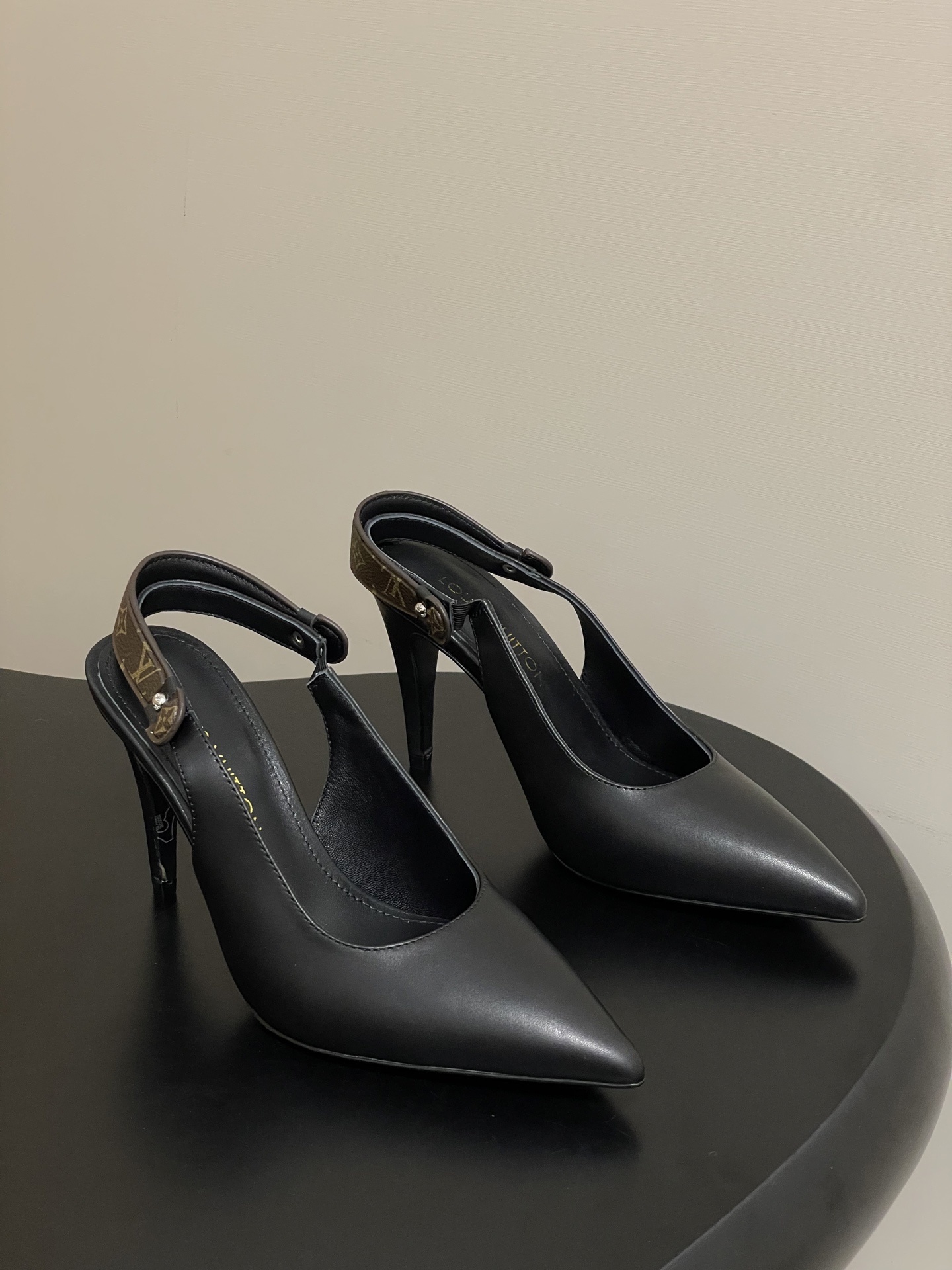 Louis Vuitton Black Leather Slingback Pumps with Monogram Detail