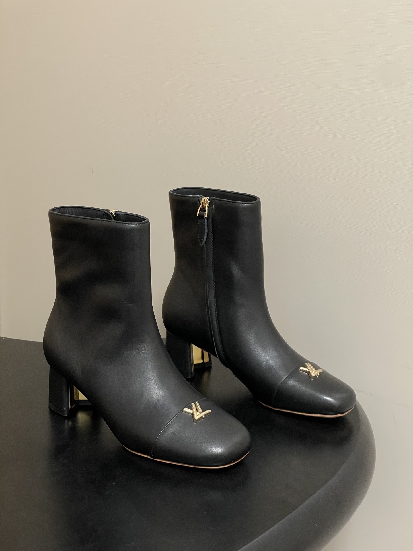 Louis Vuitton Black Leather Ankle Boots with Gold LV Logo & Block Heel