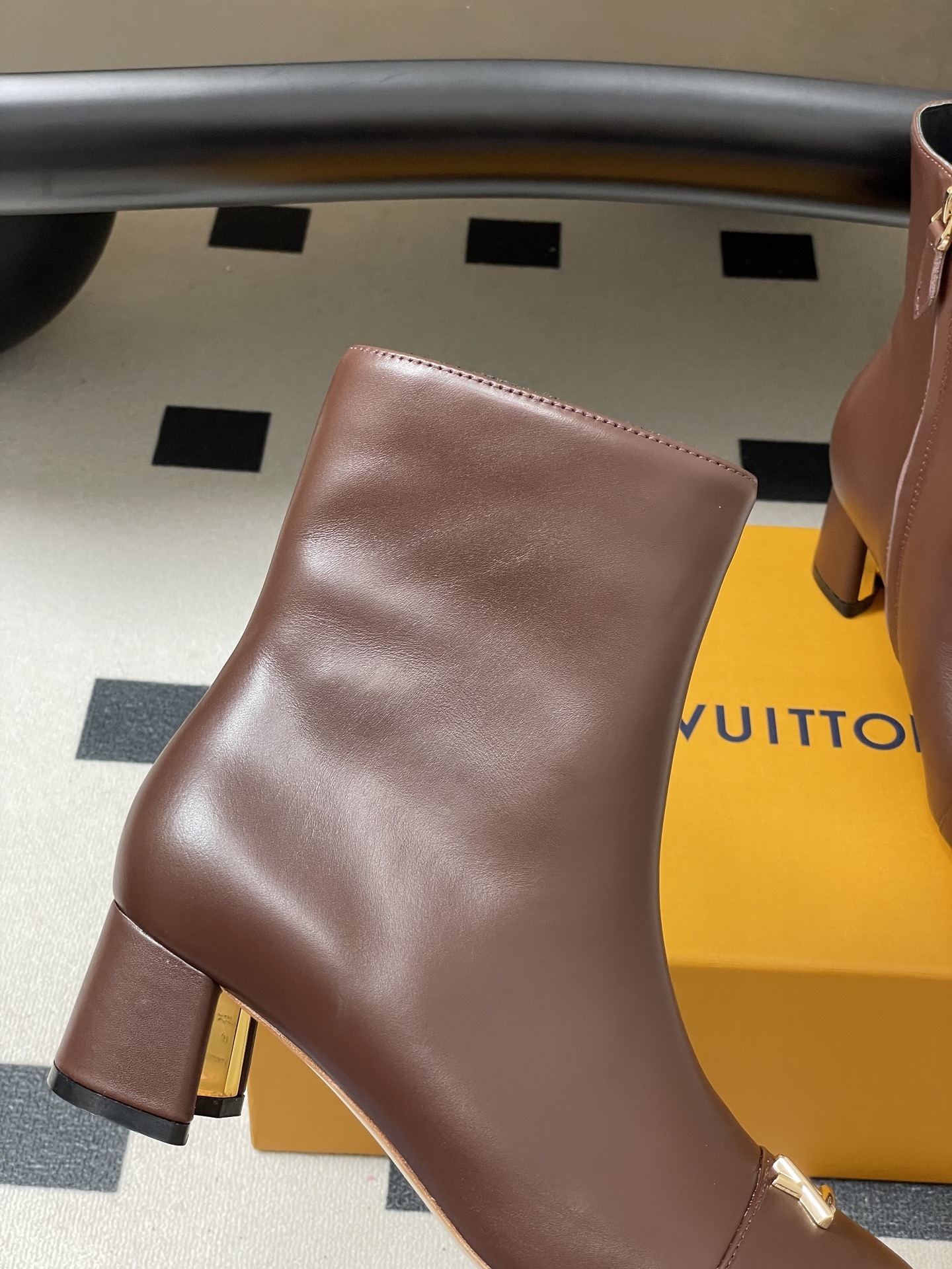 Luxury Brown Leather Ankle Boots with Gold LV Logo Detail