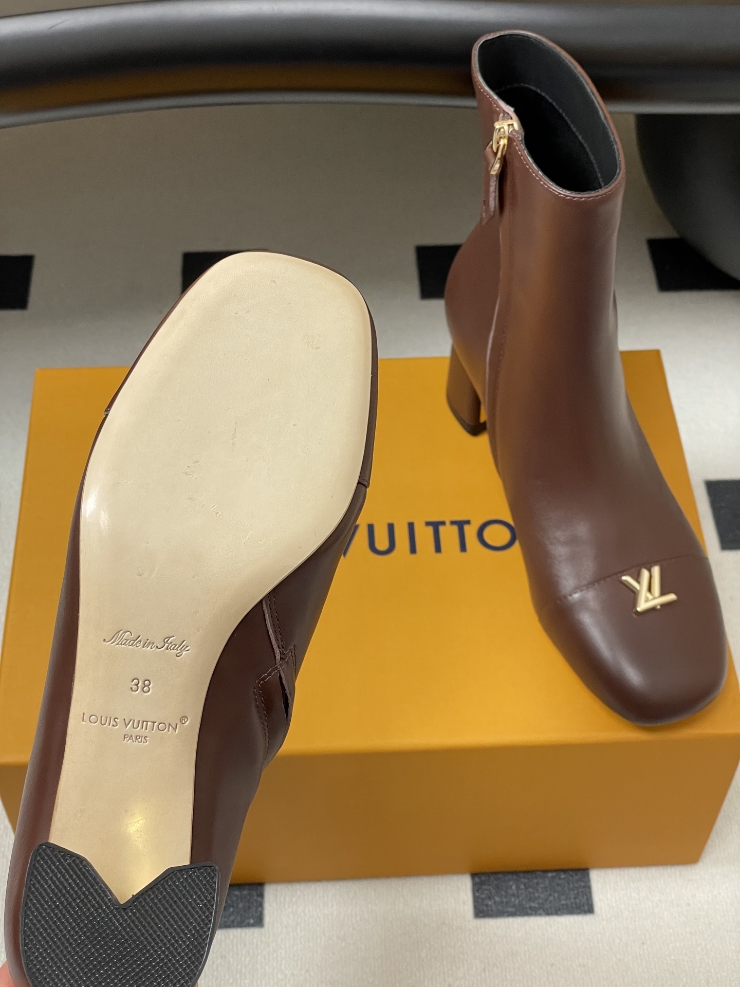 Luxury Brown Leather Ankle Boots with Gold LV Logo Detail