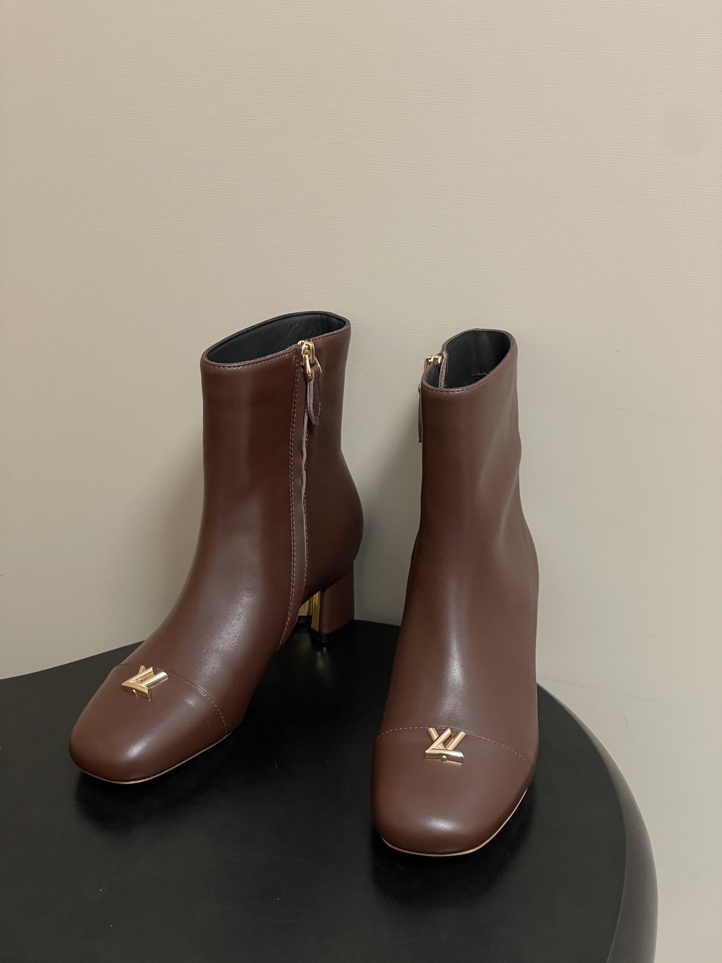 Luxury Brown Leather Ankle Boots with Gold LV Logo Detail
