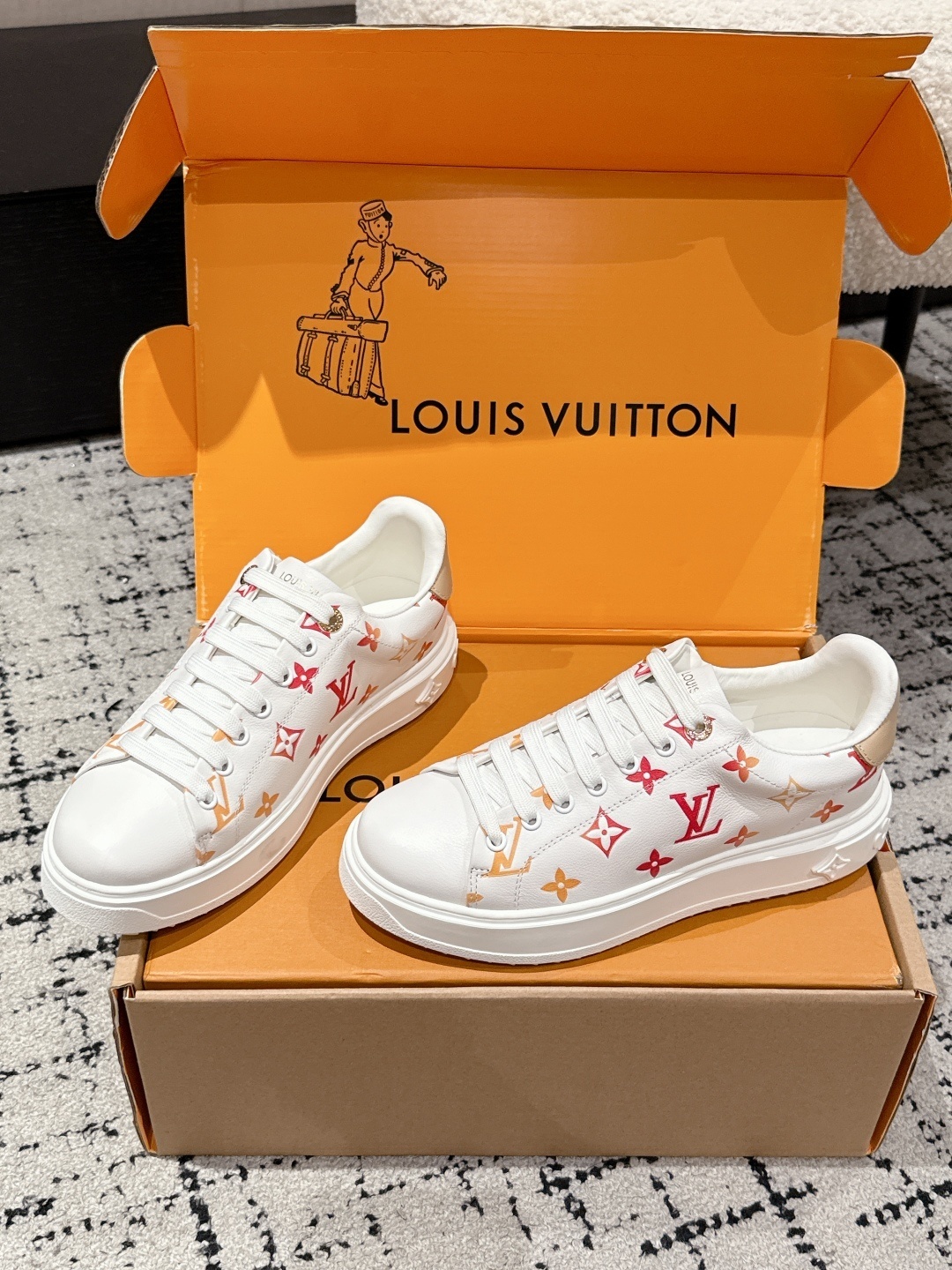 Louis Vuitton Women's White Monogram Sneakers - Luxury Fashion
