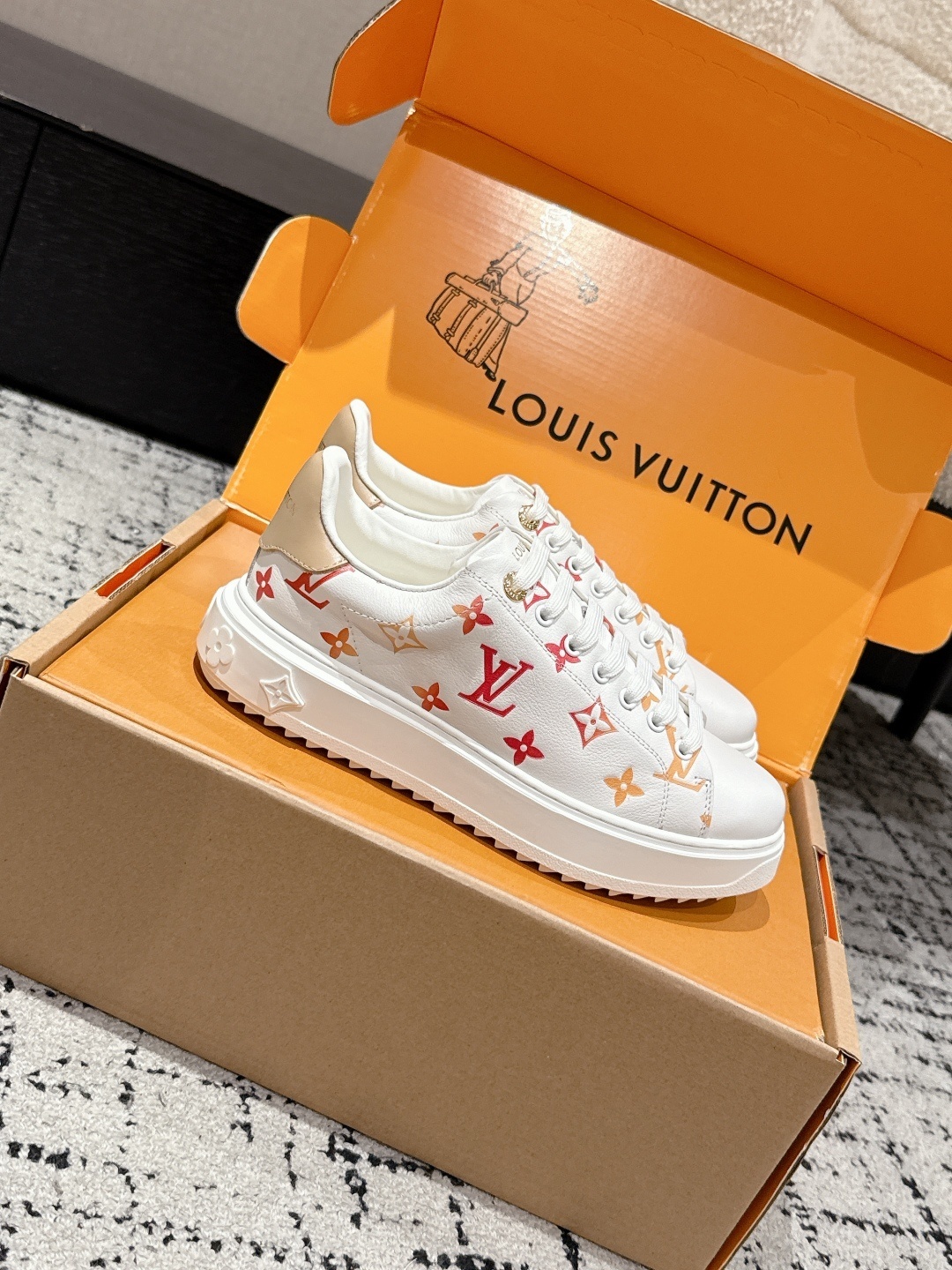 Louis Vuitton Women's White Monogram Sneakers - Luxury Fashion