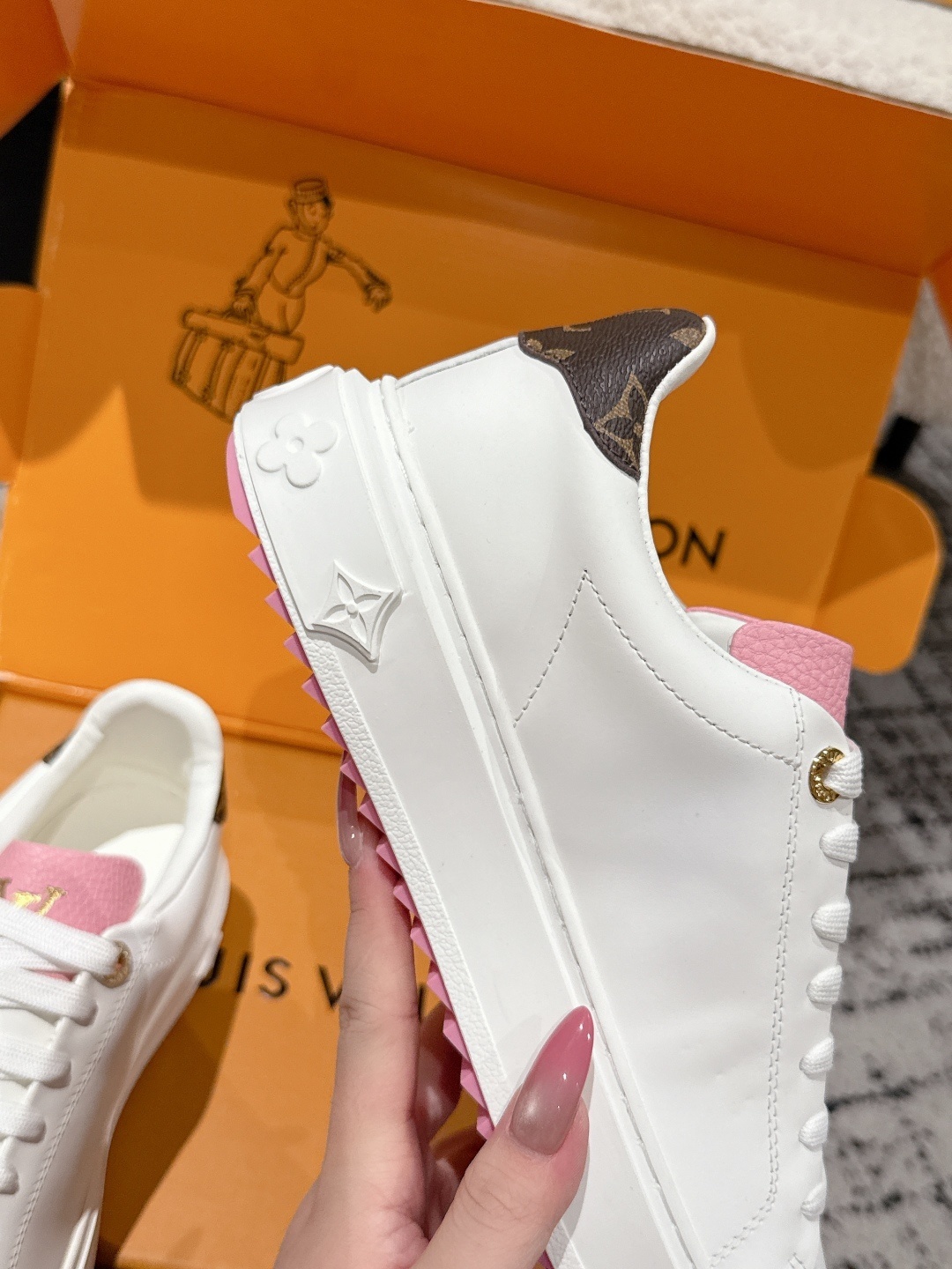 Louis Vuitton Women's White Leather Sneakers with Pink Accents