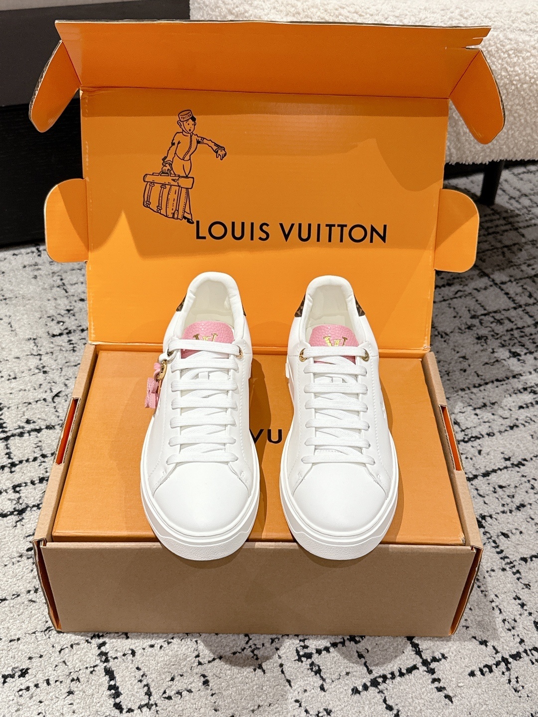 Louis Vuitton Women’s White Leather Sneakers with Pink Accents