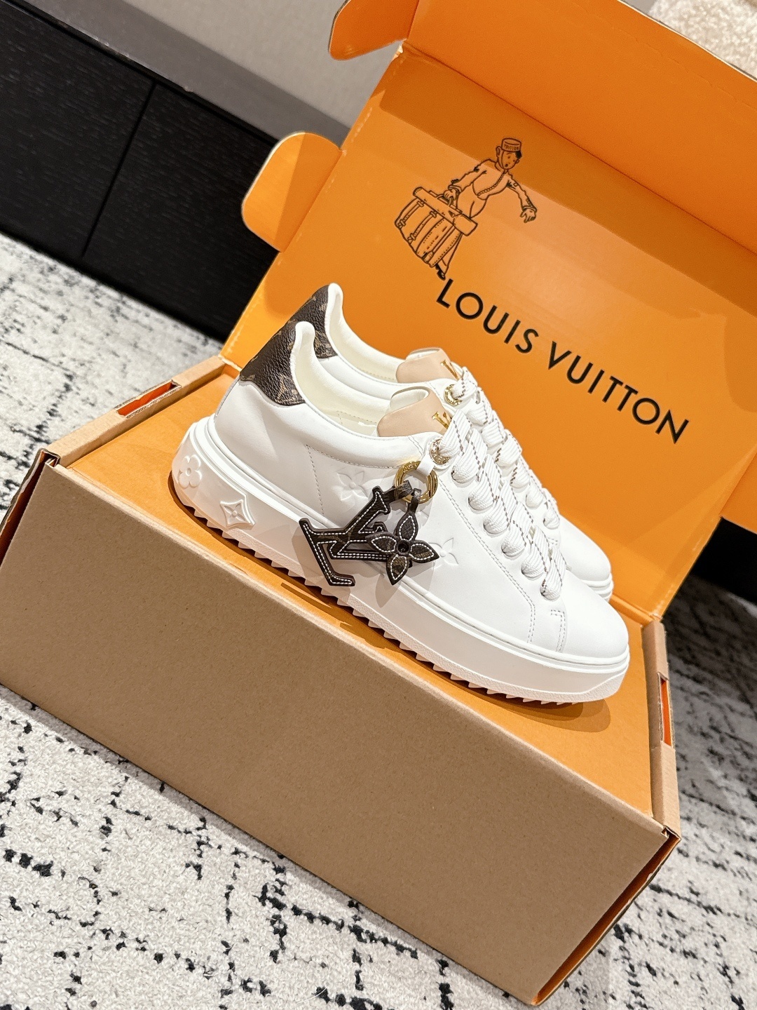 Louis Vuitton White Leather Women's Sneakers with Monogram Accents