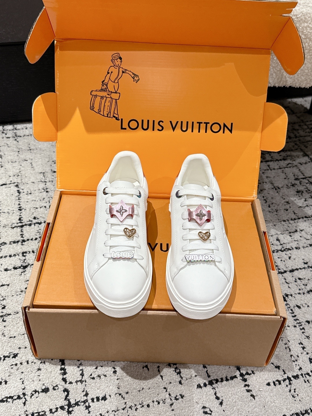 Louis Vuitton Women’s White Leather Sneakers with Signature Charms