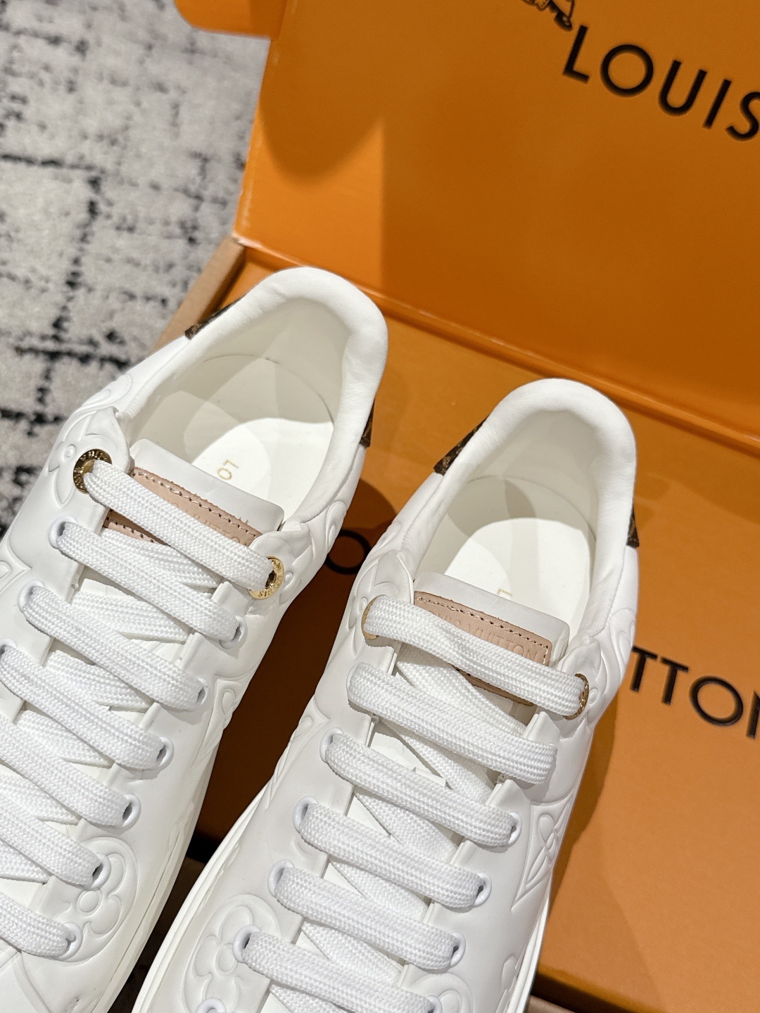 Louis Vuitton White Embossed Monogram Leather Sneakers