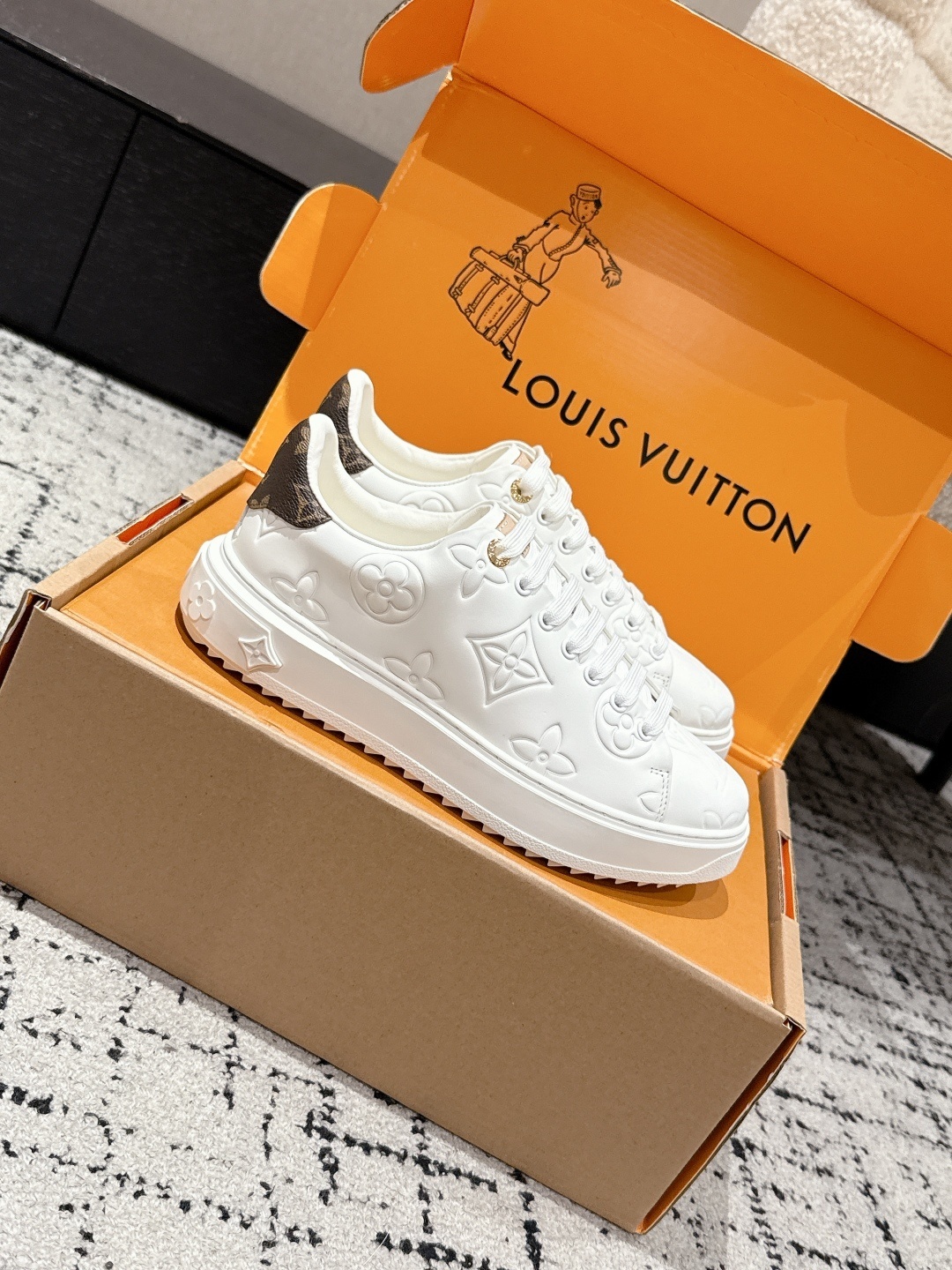 Louis Vuitton White Embossed Monogram Leather Sneakers