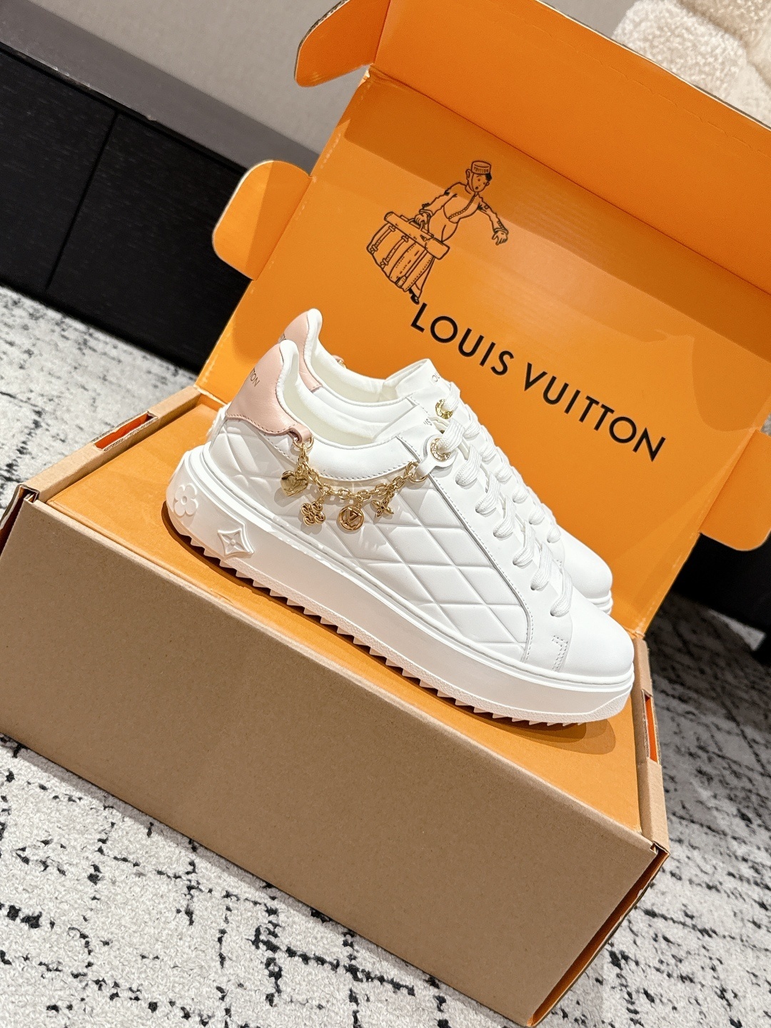 Louis Vuitton White Leather Women's Sneakers with Gold Chain Details