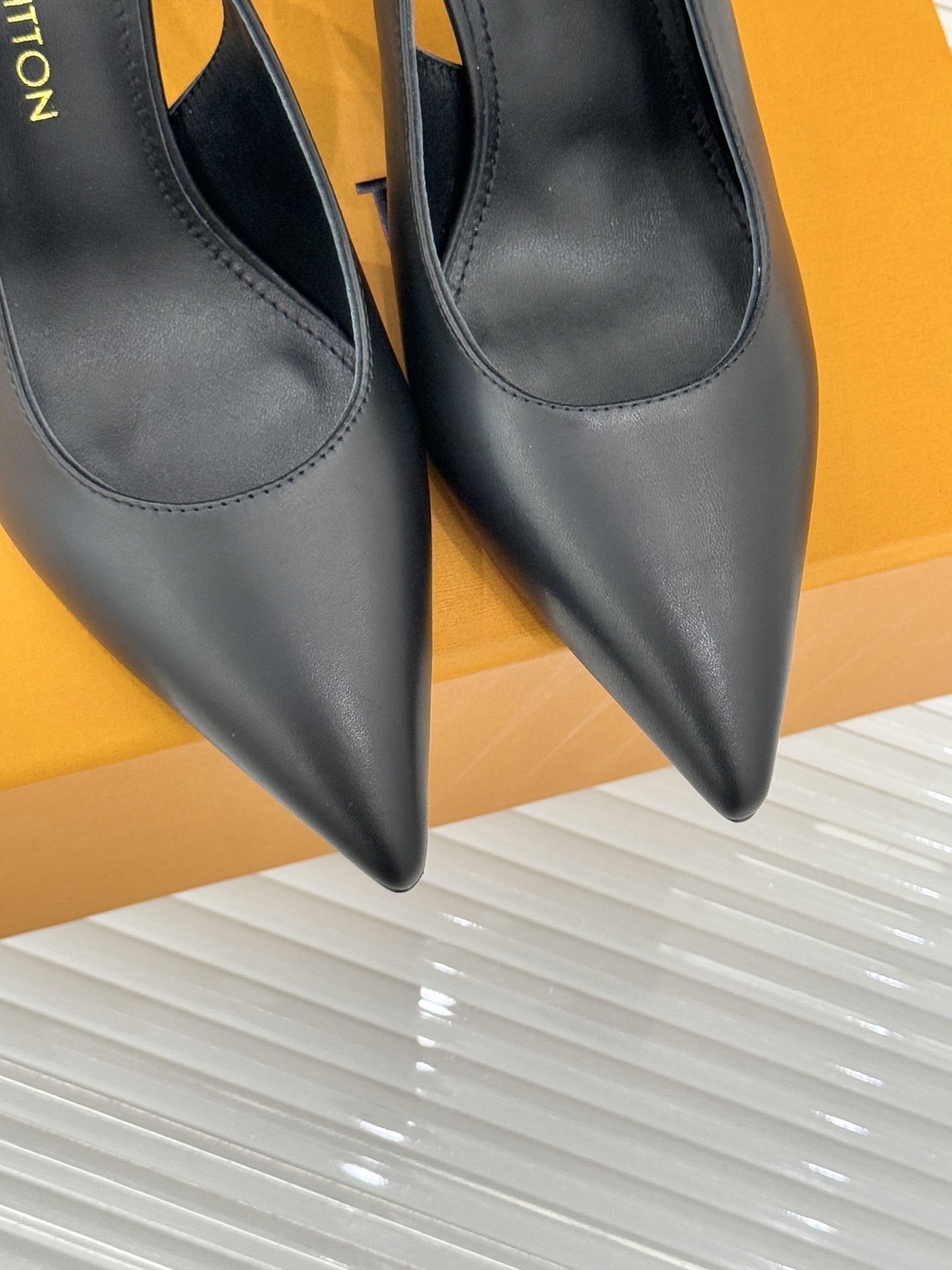 Louis Vuitton Black Leather Slingback Pumps with Monogram Strap