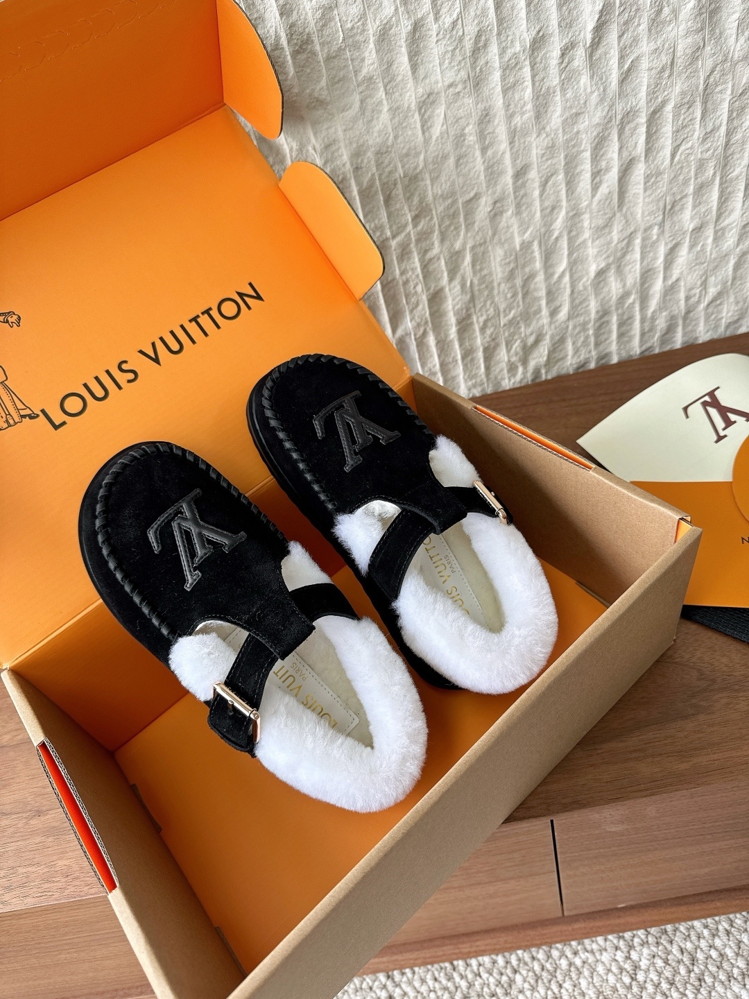 Louis Vuitton Black Suede Shearling Mules with LV Logo