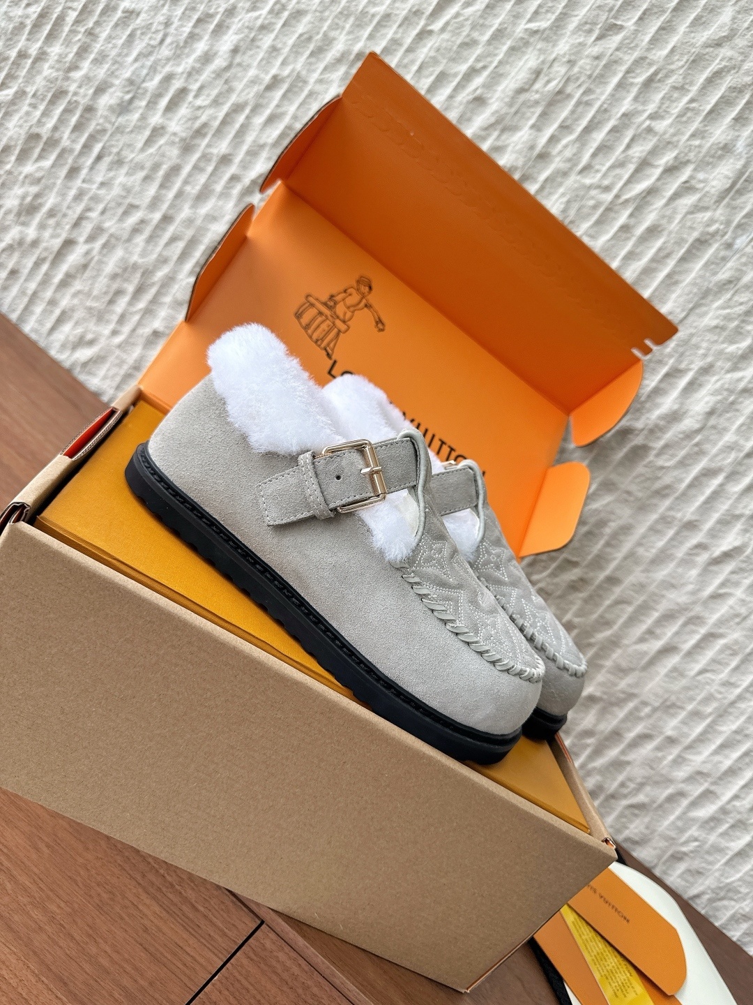 Louis Vuitton Monogram Embossed Shearling Mules - Beige Suede