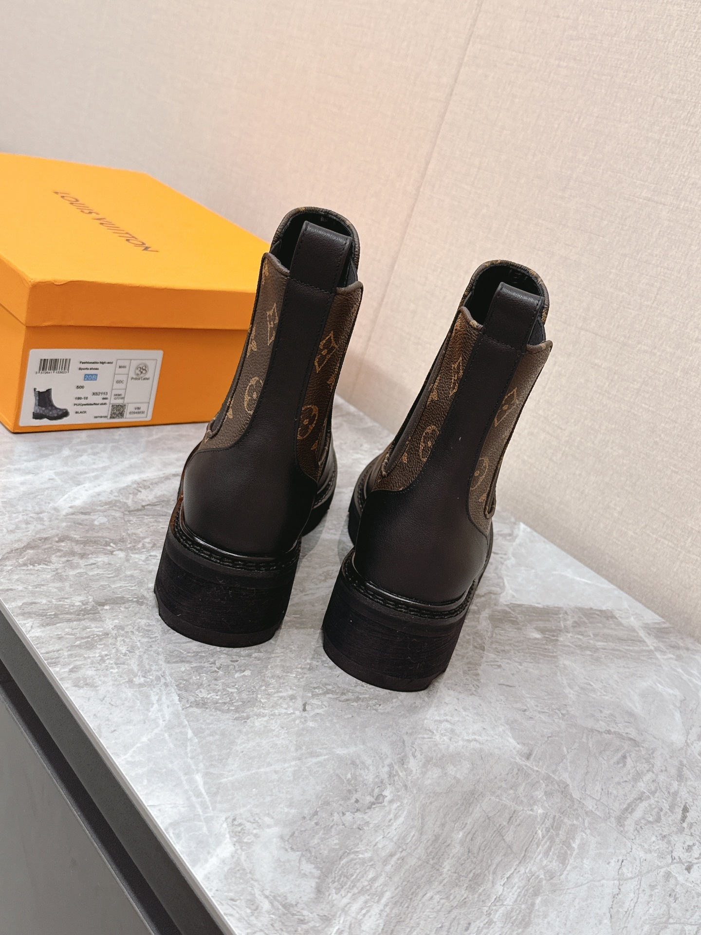 Louis Vuitton Monogram Leather Chelsea Boots in Black