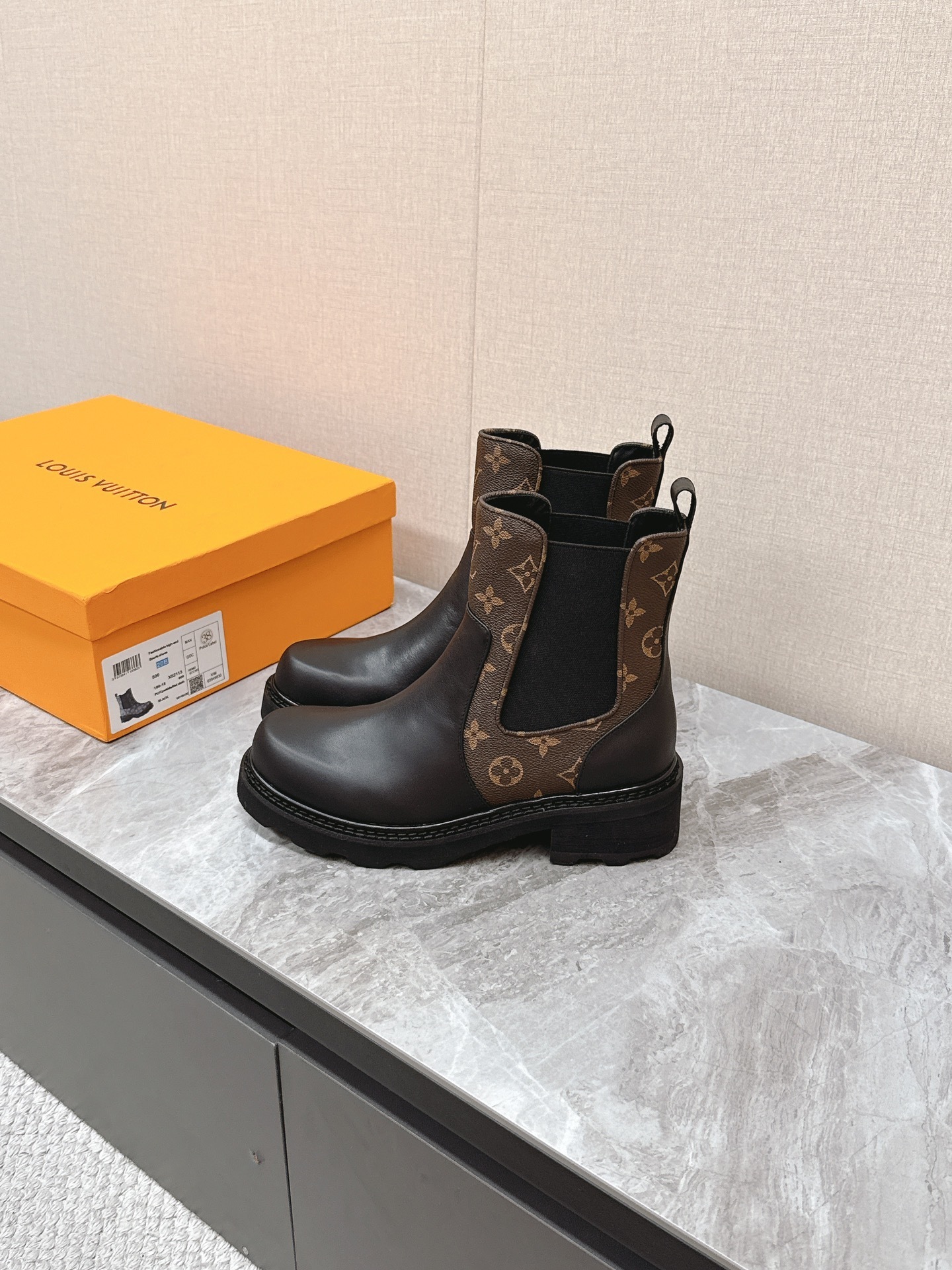 Louis Vuitton Monogram Leather Chelsea Boots in Black