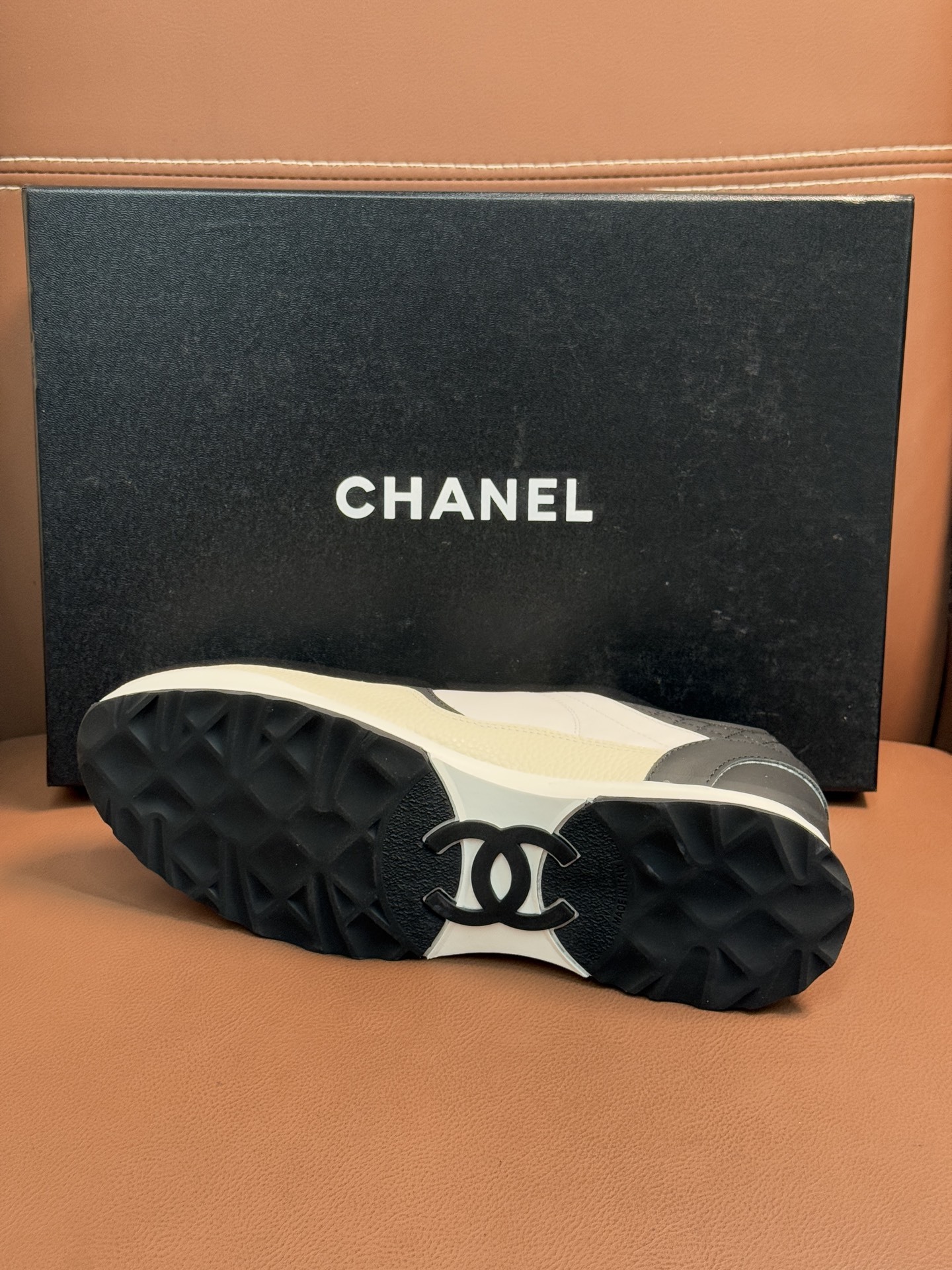 Chanel Luxury Black and White Leather Sneakers with Quilted Detail