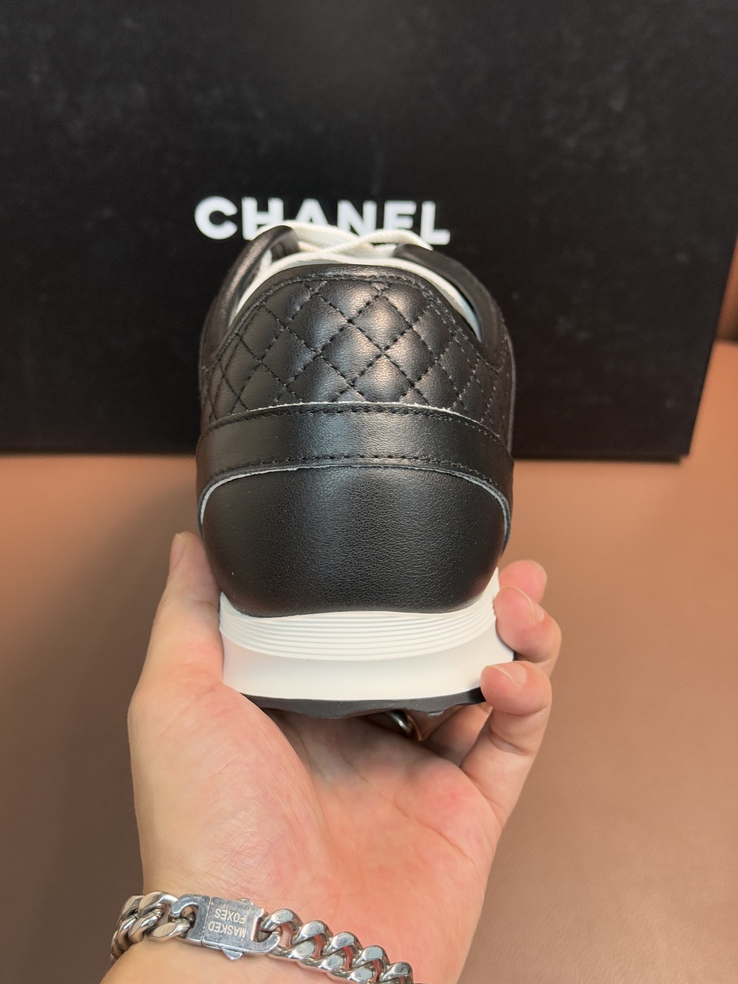 Chanel Black & White Leather Sneakers - Classic CC Logo Design