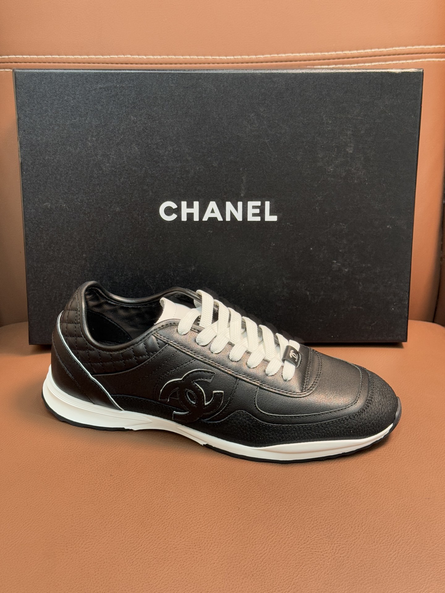 Chanel Black & White Leather Sneakers - Classic CC Logo Design
