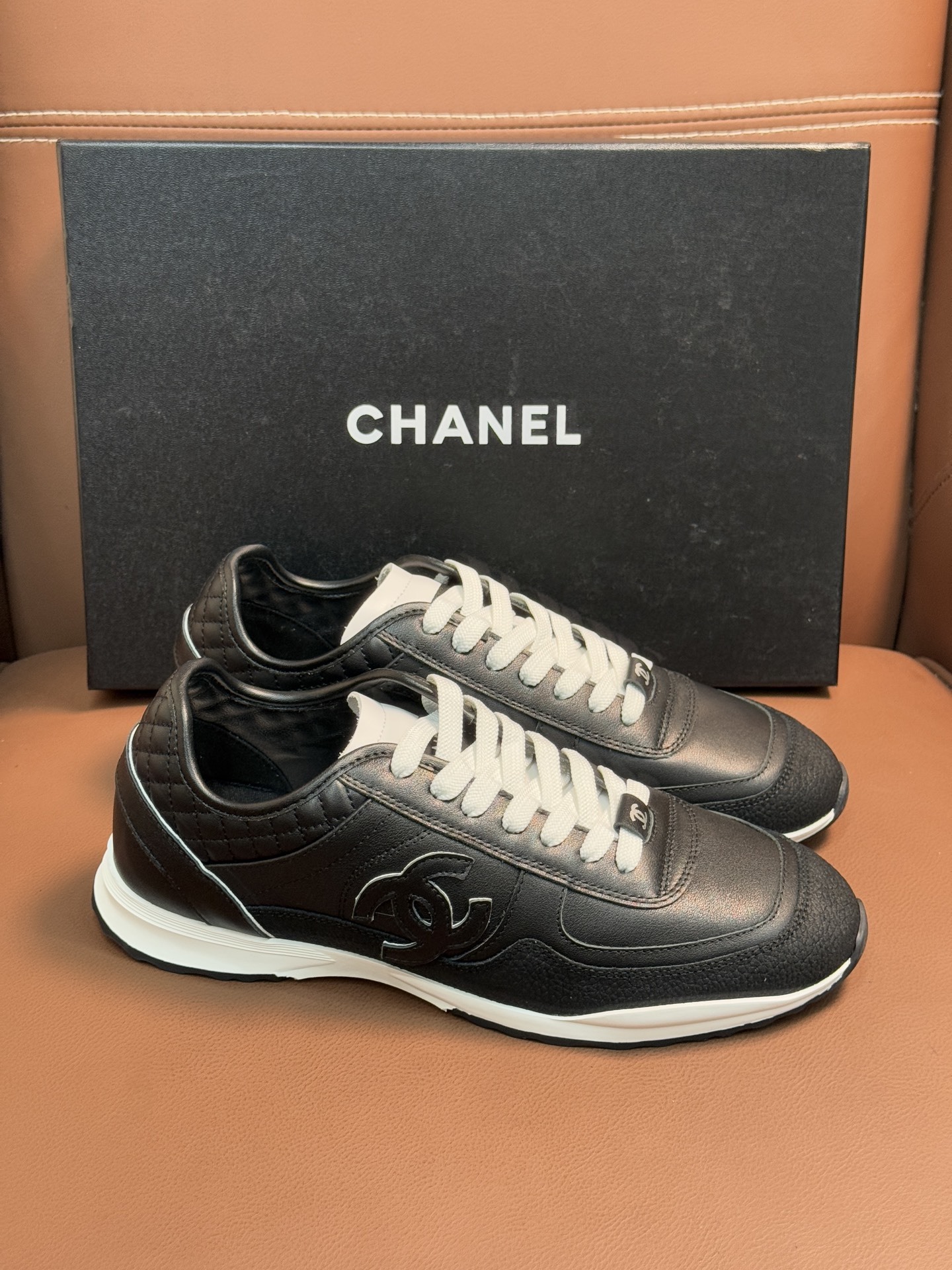 Chanel Black & White Leather Sneakers - Classic CC Logo Design