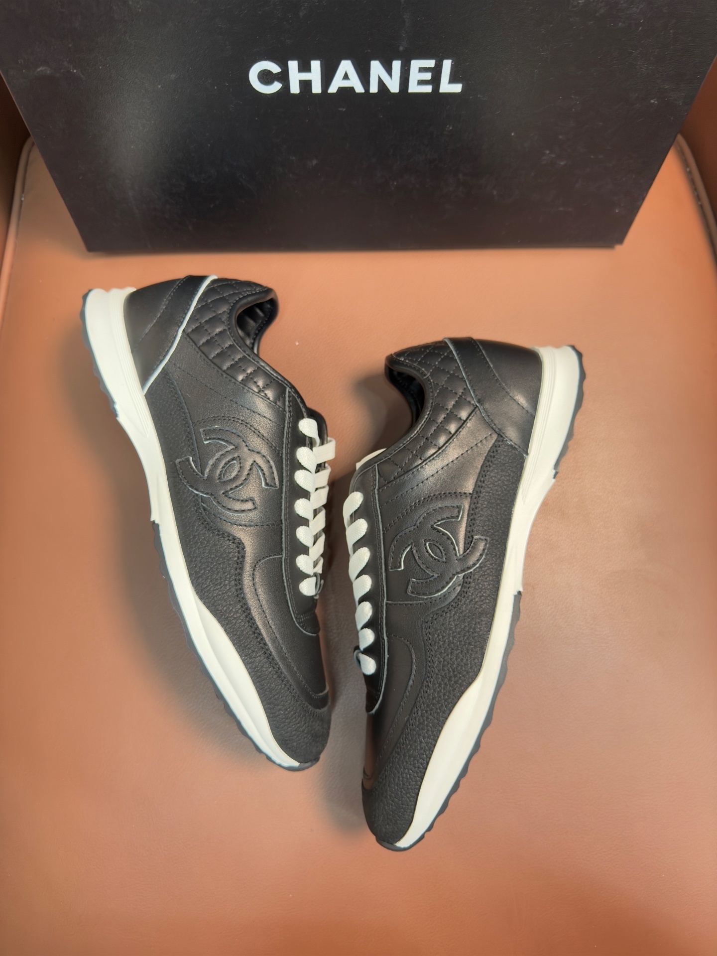 Chanel Black & White Leather Sneakers - Classic CC Logo Design