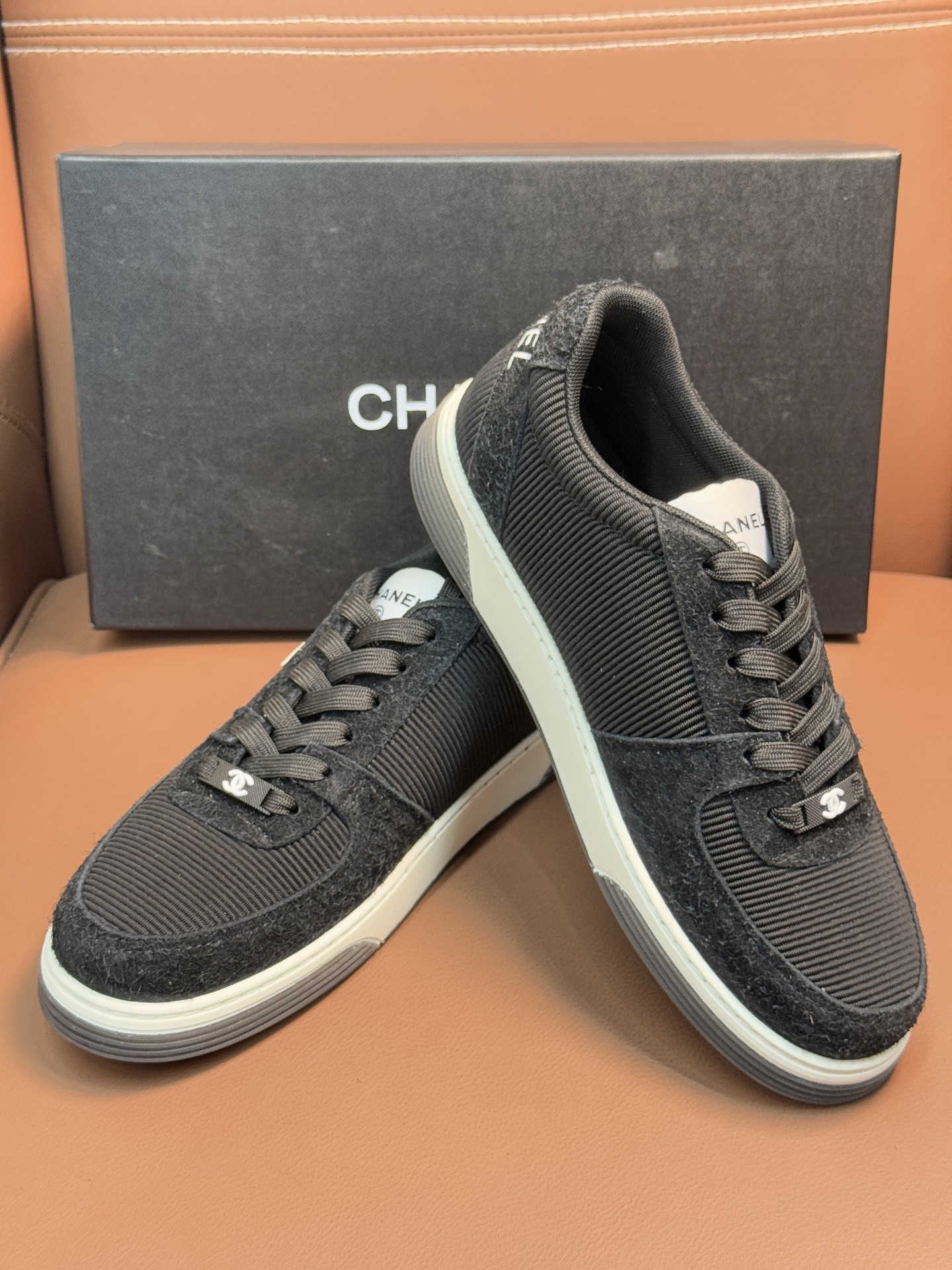 Chanel Luxury Black Ribbed Fabric Sneakers with Iconic CC Logo