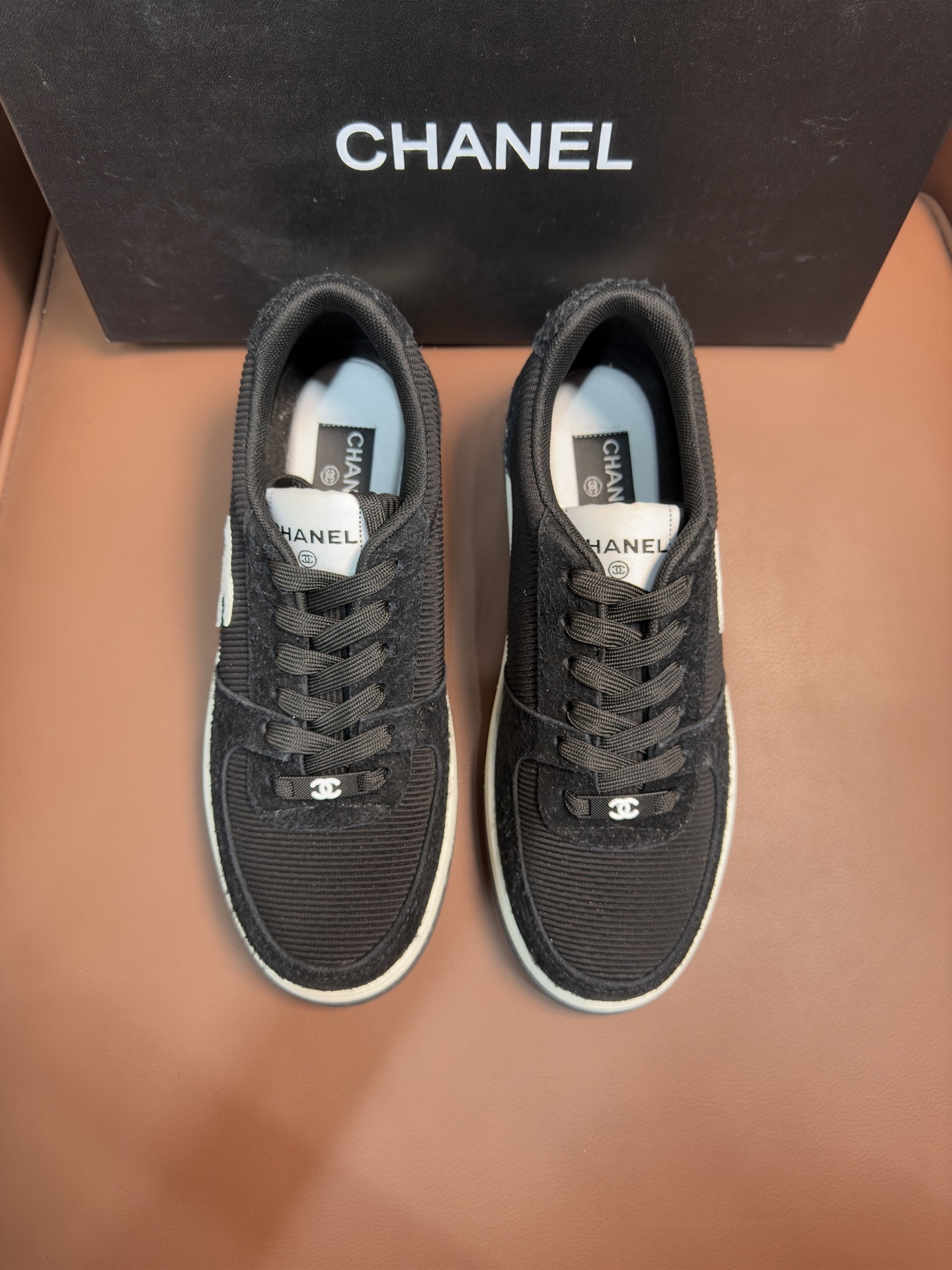Chanel Luxury Black Ribbed Fabric Sneakers with Iconic CC Logo