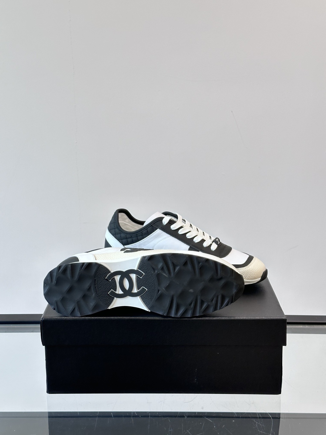 Luxury Chanel CC Logo Sneakers - Black & White Leather Trainers