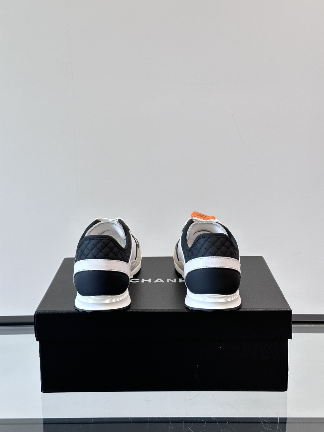 Luxury Chanel CC Logo Sneakers - Black & White Leather Trainers