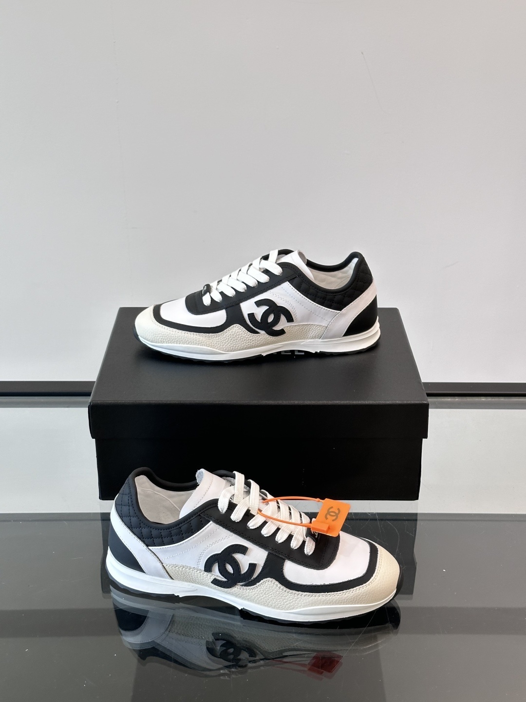 Luxury Chanel CC Logo Sneakers - Black & White Leather Trainers