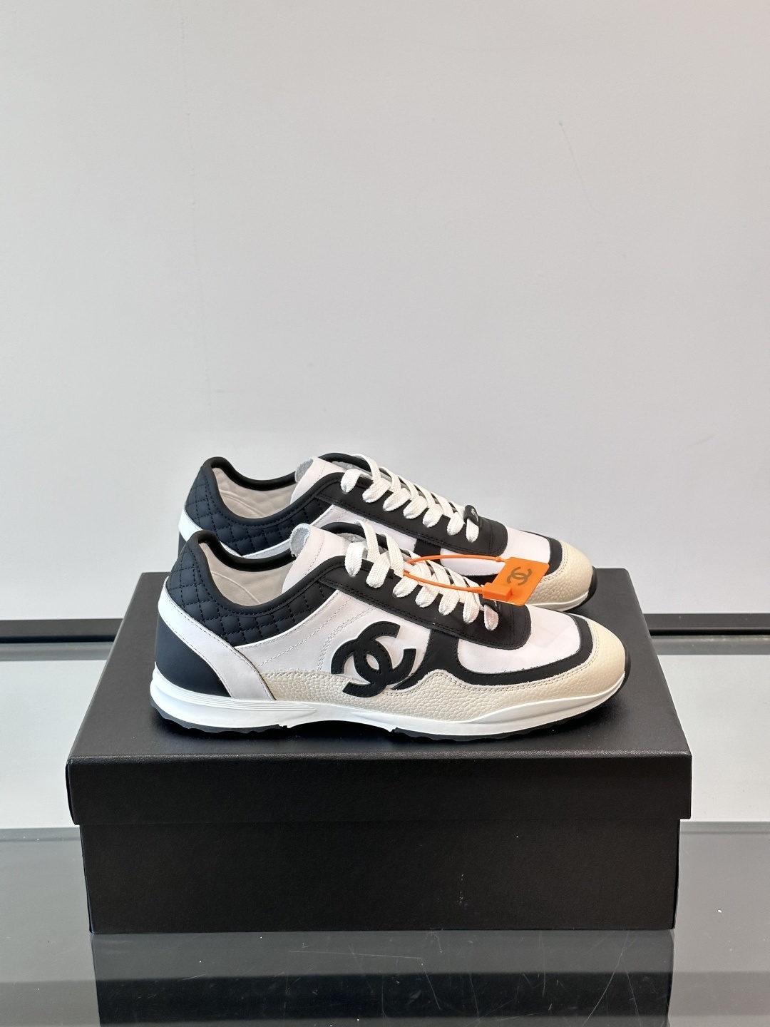 Luxury Chanel CC Logo Sneakers – Black & White Leather Trainers