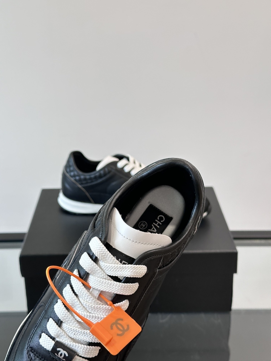 Chanel Black Quilted Leather Sneakers - Iconic CC Logo Trainers