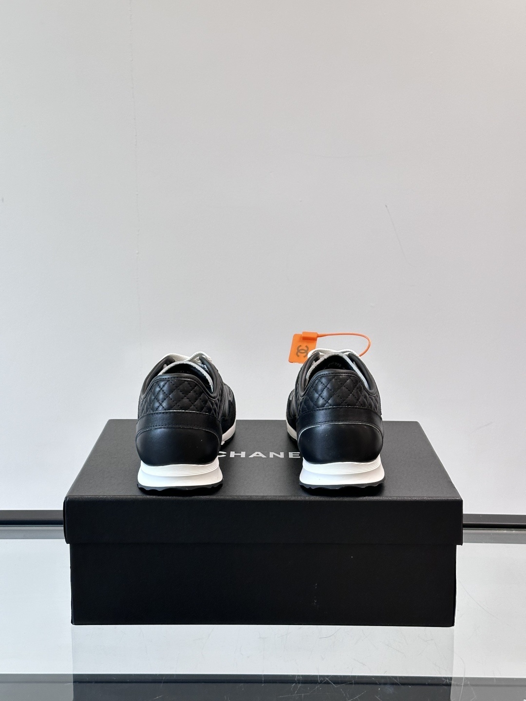 Chanel Black Quilted Leather Sneakers - Iconic CC Logo Trainers