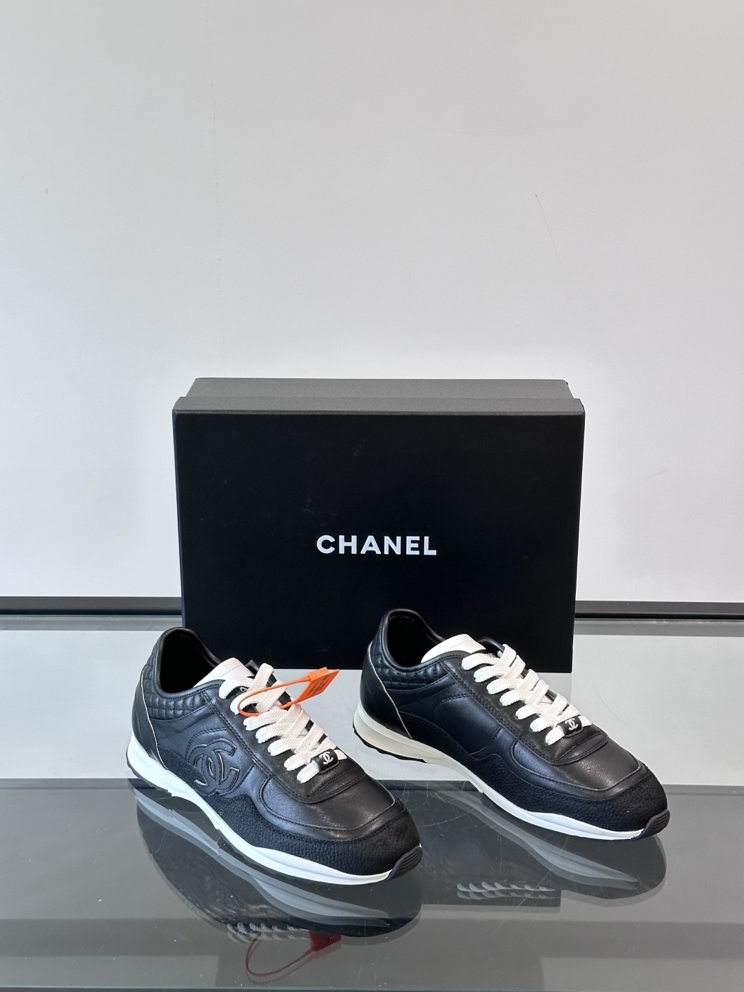 Chanel Black Quilted Leather Sneakers - Iconic CC Logo Trainers