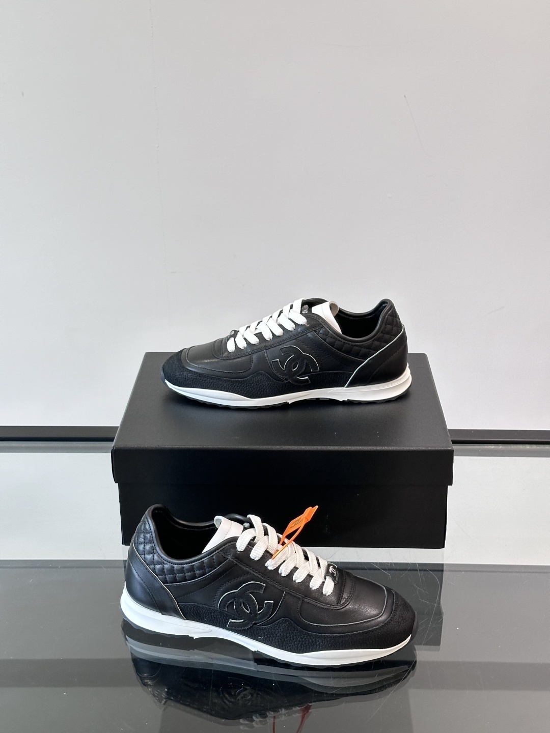 Chanel Black Quilted Leather Sneakers - Iconic CC Logo Trainers