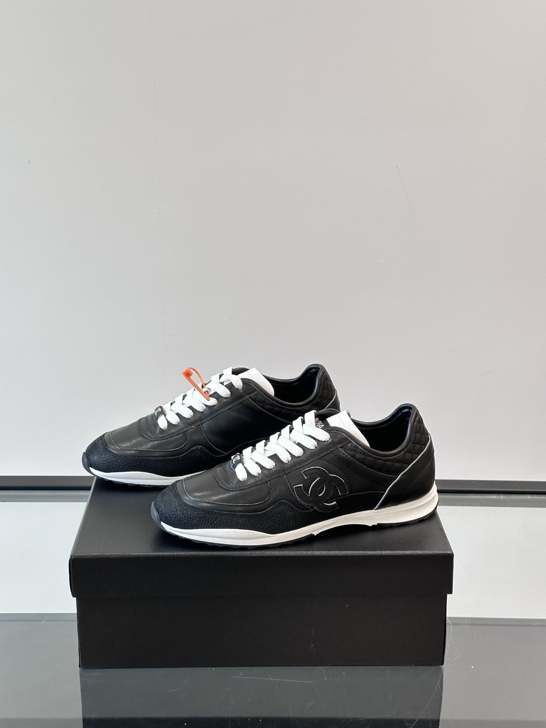 Chanel Black Quilted Leather Sneakers - Iconic CC Logo Trainers