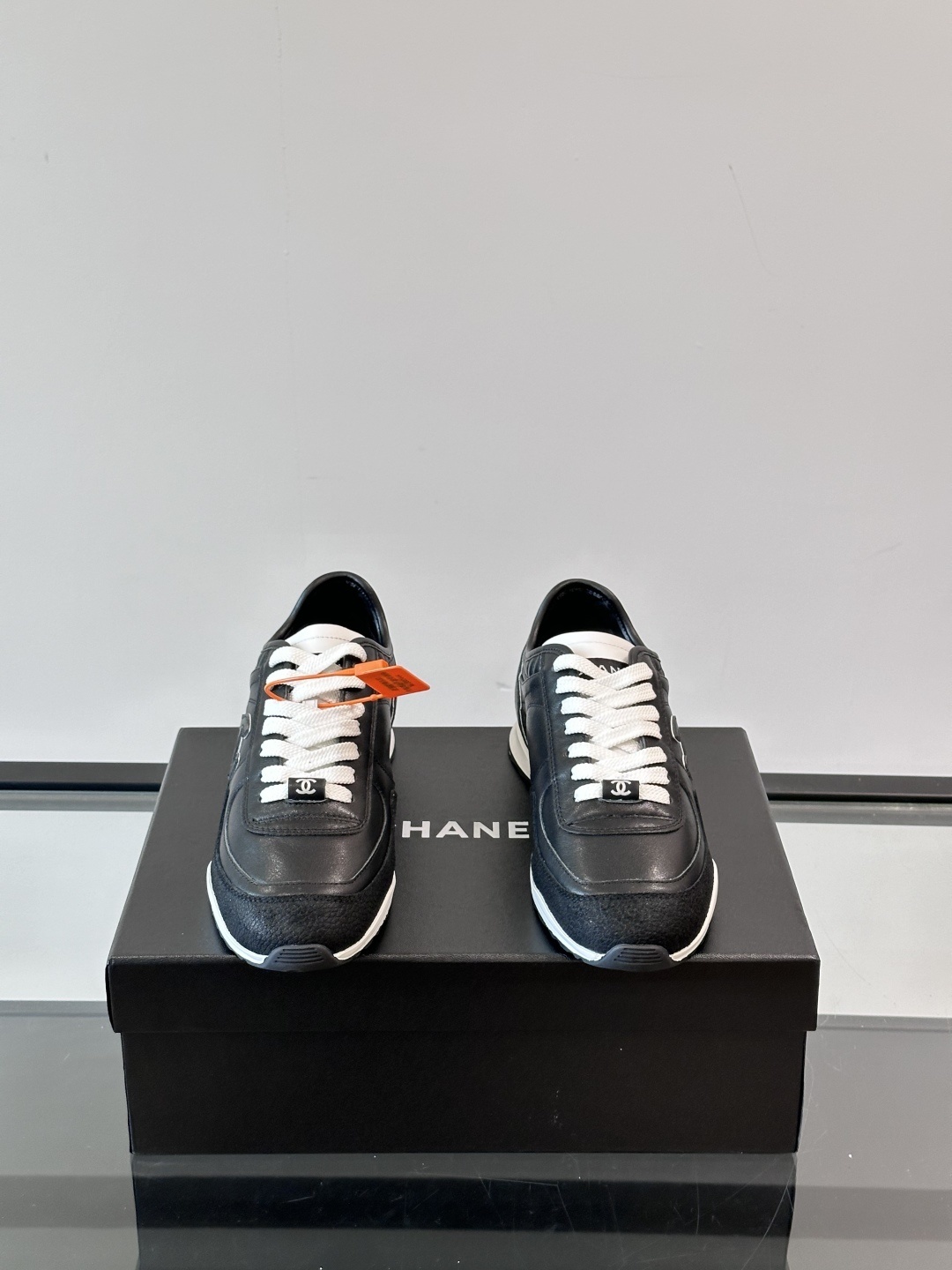 Chanel Black Quilted Leather Sneakers - Iconic CC Logo Trainers