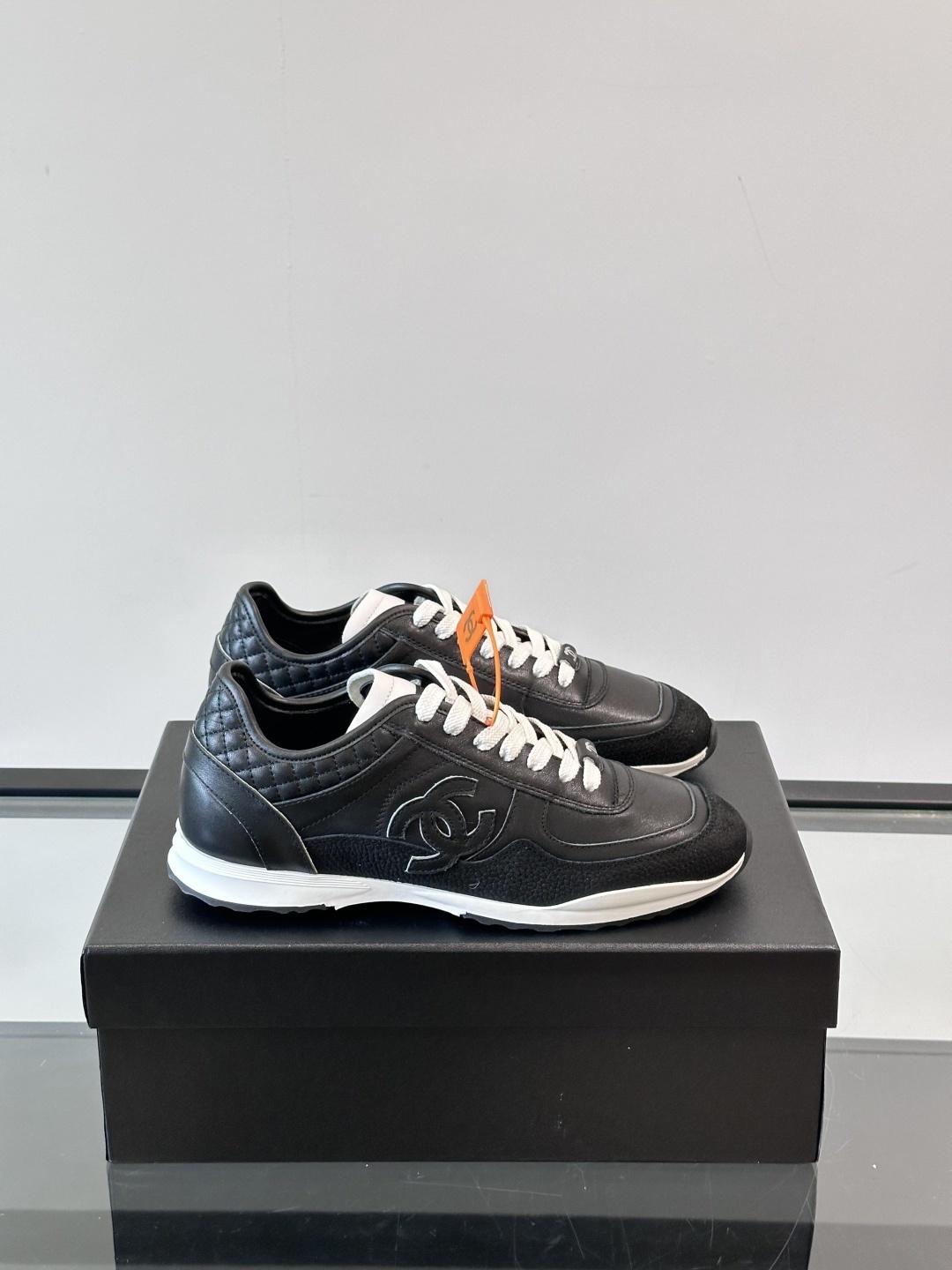 Chanel Black Quilted Leather Sneakers – Iconic CC Logo Trainers