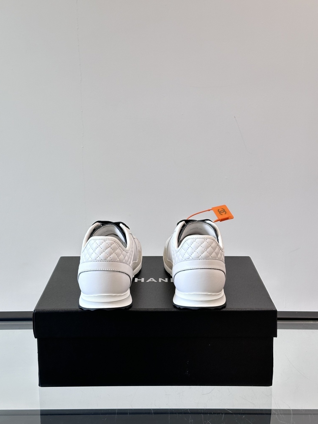 Chanel White Leather Low-Top Sneakers - Quilted Design Luxury Shoes