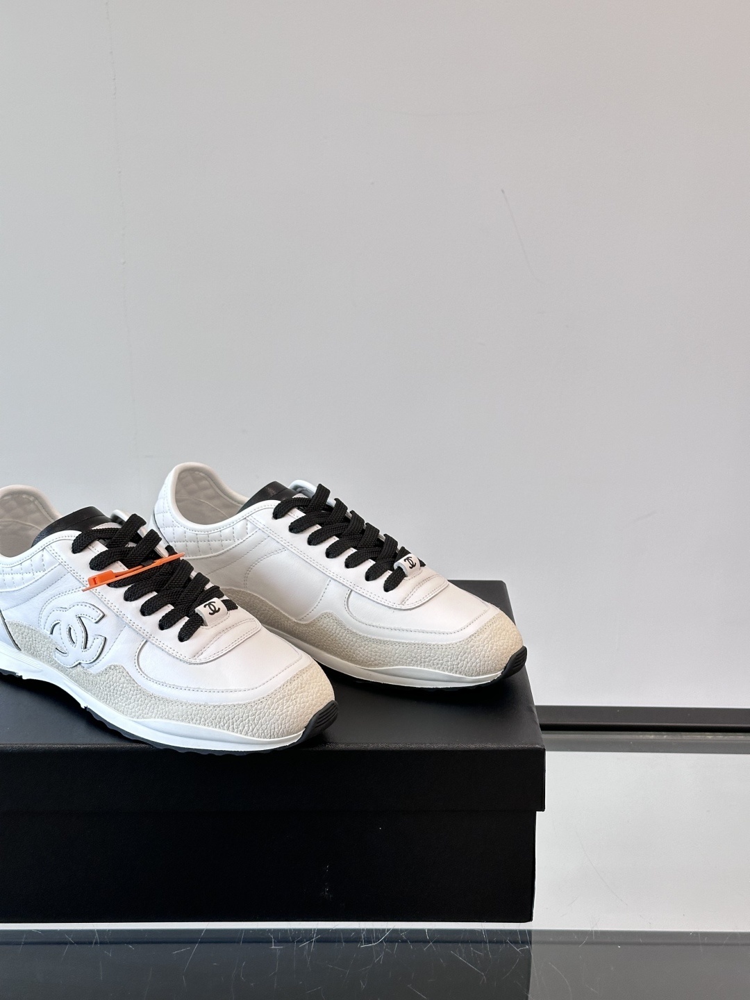 Chanel White Leather Low-Top Sneakers - Quilted Design Luxury Shoes