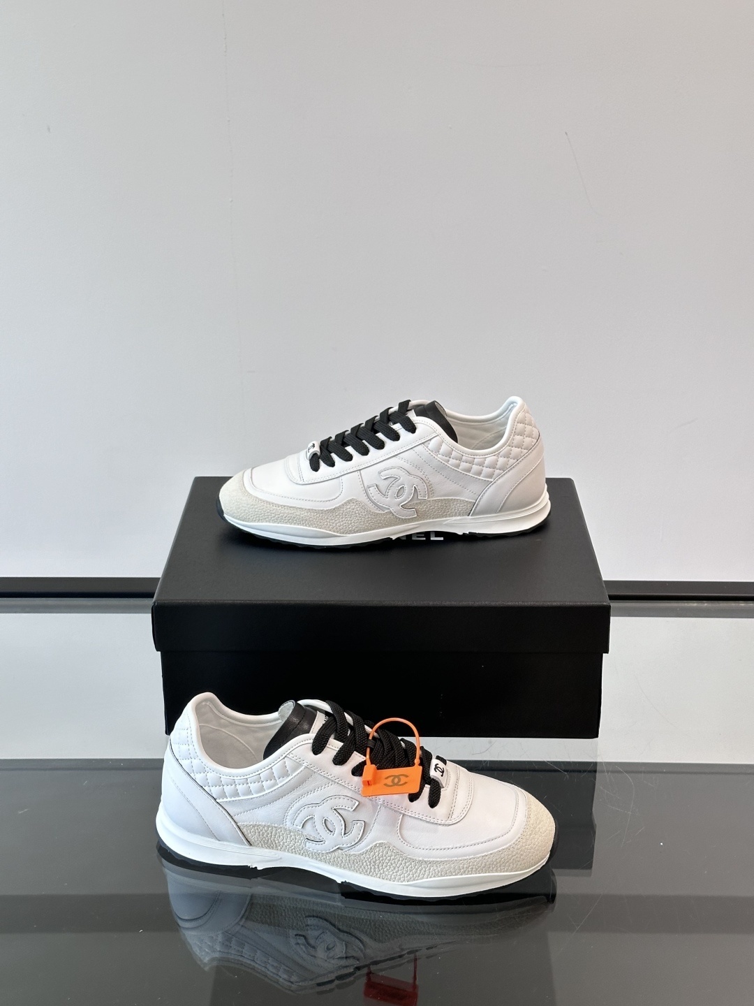 Chanel White Leather Low-Top Sneakers - Quilted Design Luxury Shoes