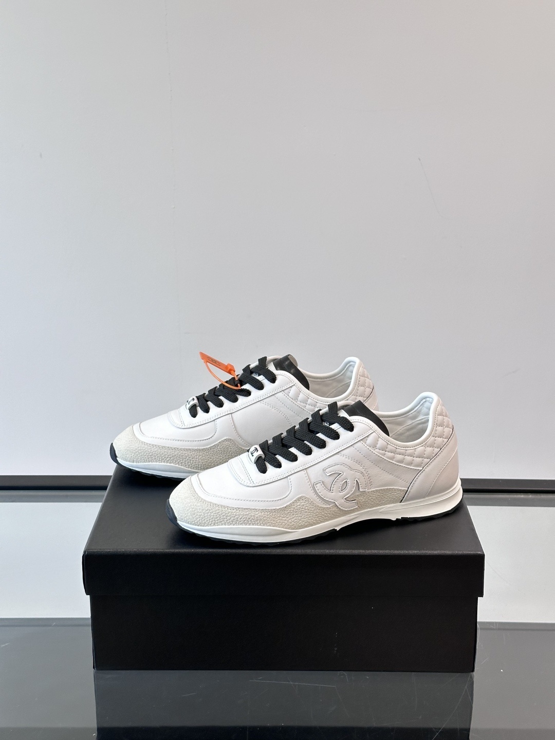 Chanel White Leather Low-Top Sneakers - Quilted Design Luxury Shoes