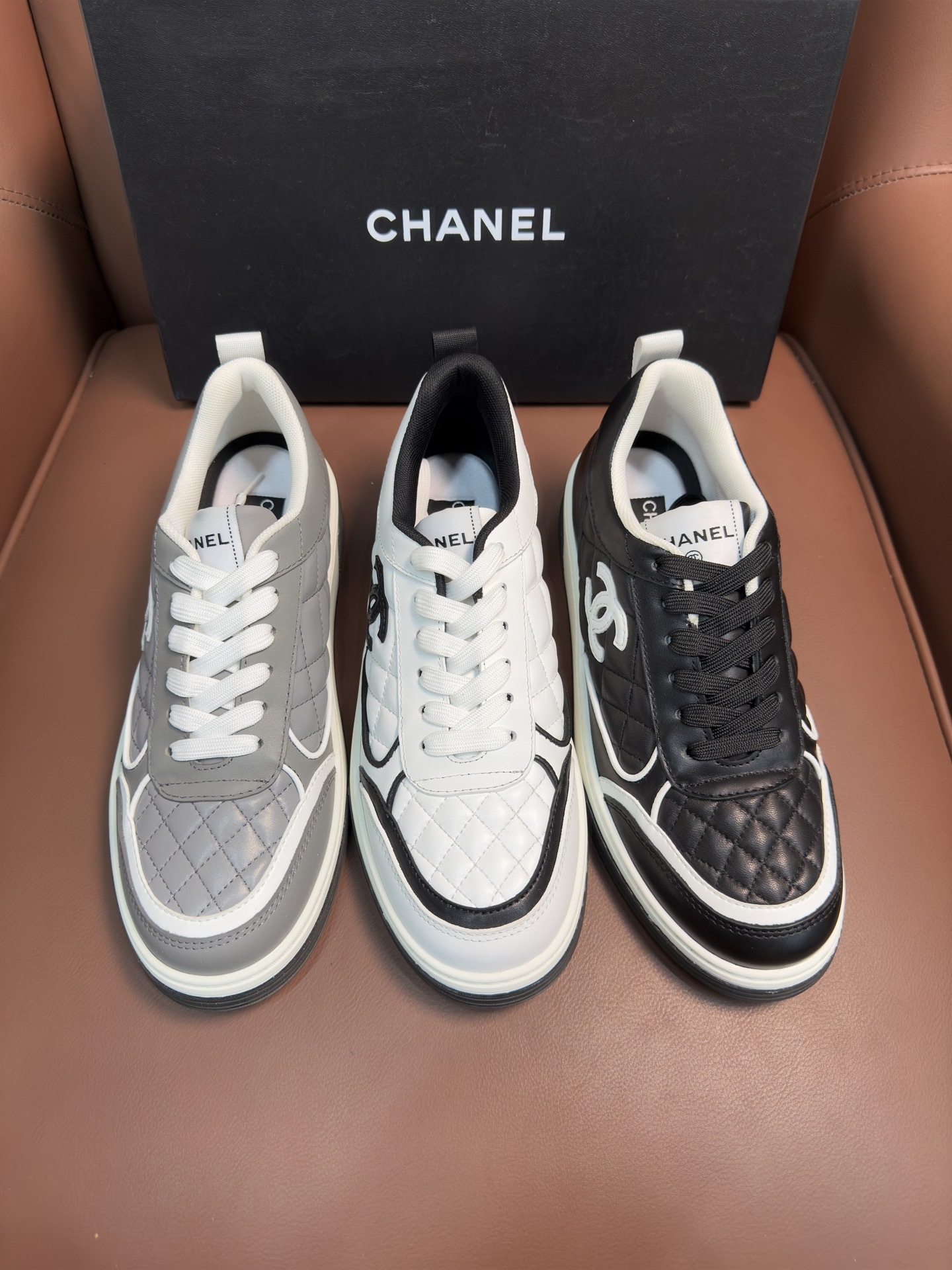 Chanel Quilted Leather Sneakers Black & White Designer Trainers