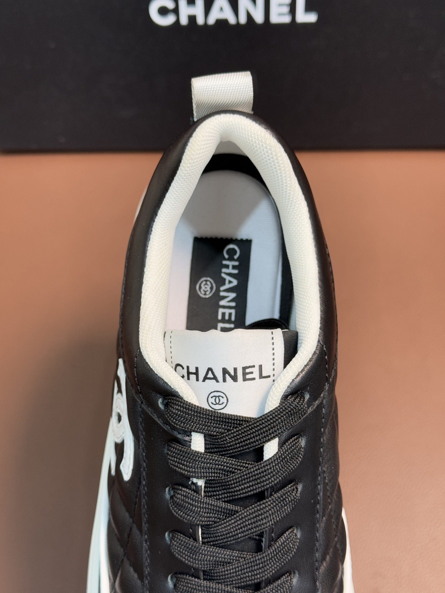 Chanel Quilted Leather Sneakers Black & White Designer Trainers