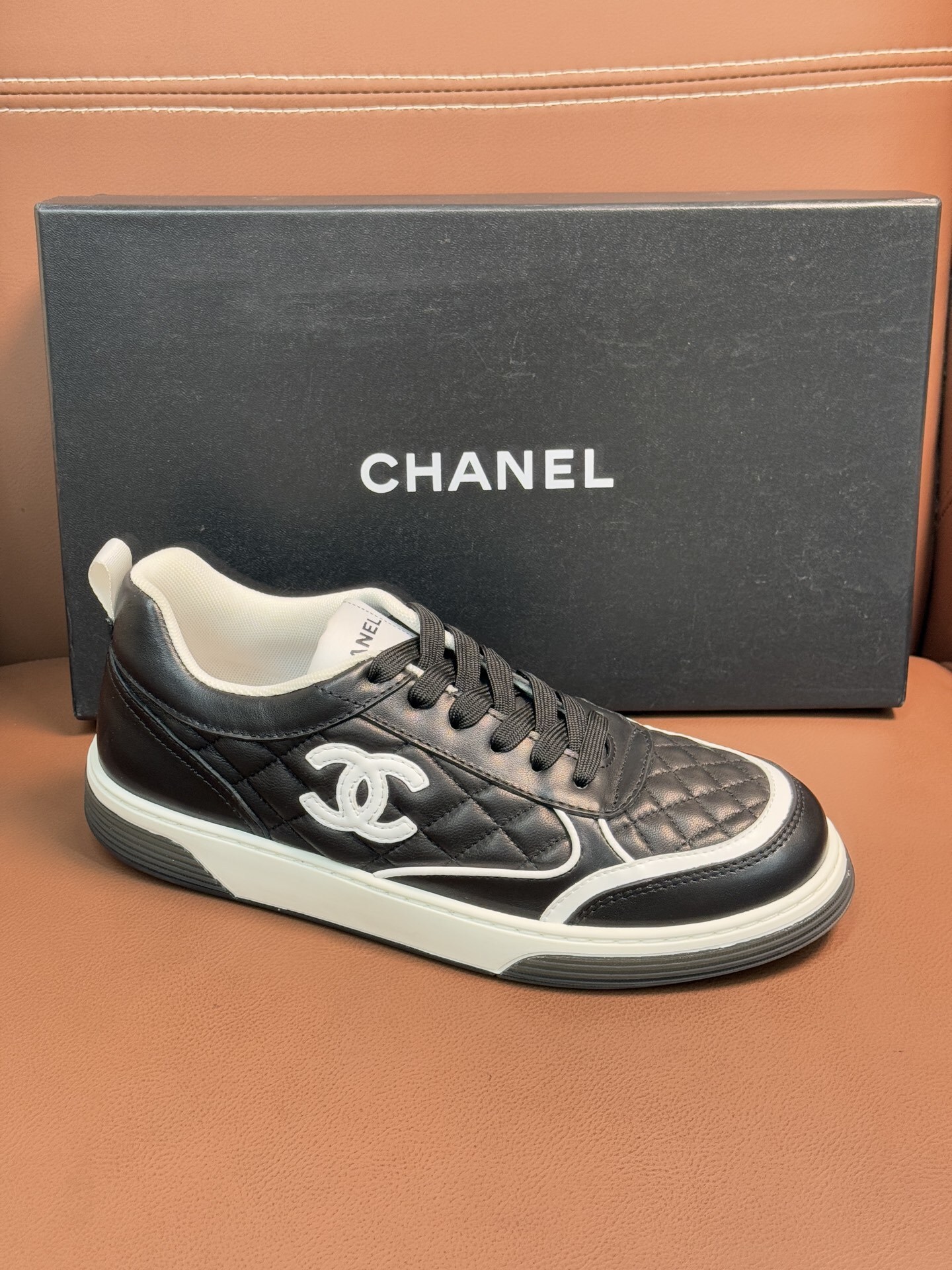 Chanel Quilted Leather Sneakers Black & White Designer Trainers