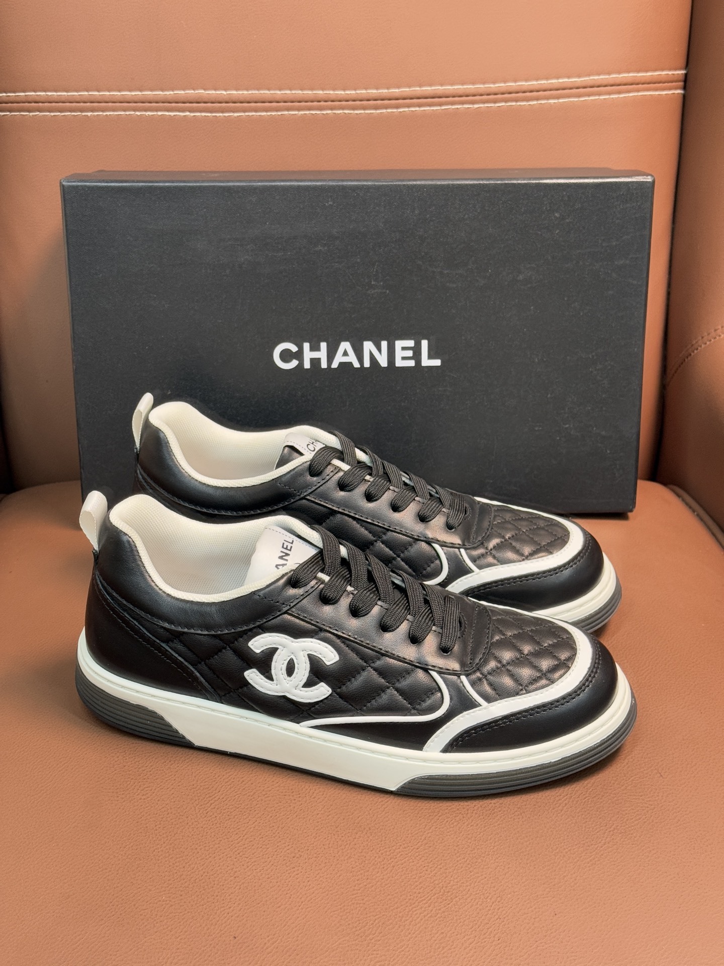 Chanel Quilted Leather Sneakers Black & White Designer Trainers