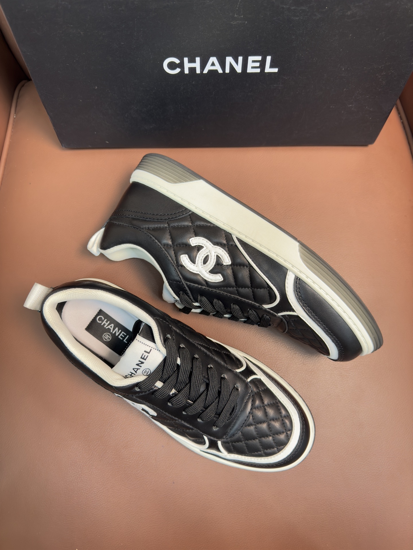 Chanel Quilted Leather Sneakers Black & White Designer Trainers